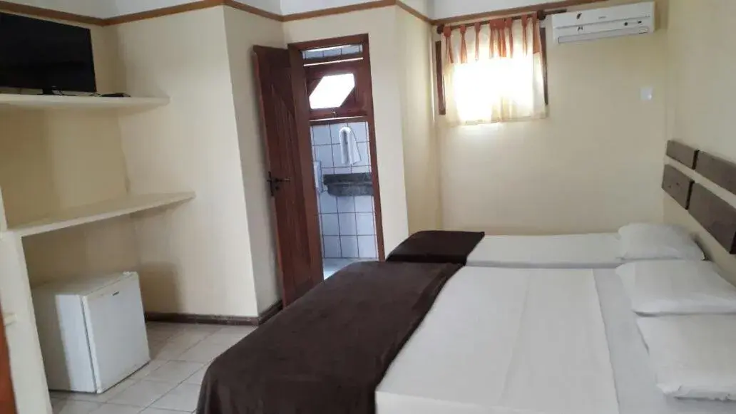 Standard Triple Room in Coroa Bella Praia Hotel Standard Triple Room in Coroa Bella Praia Hotel