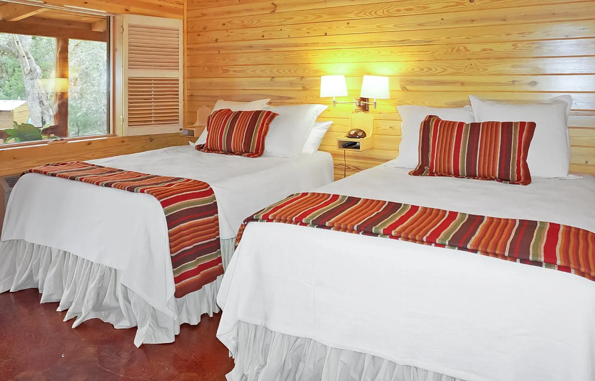 Bed in Wimberley Log Cabins Resort and Suites- Unit 7