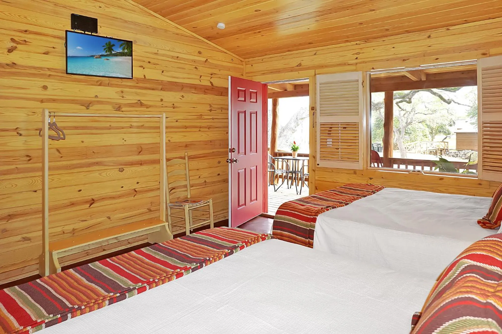 Bed in Wimberley Log Cabins Resort and Suites- Unit 7