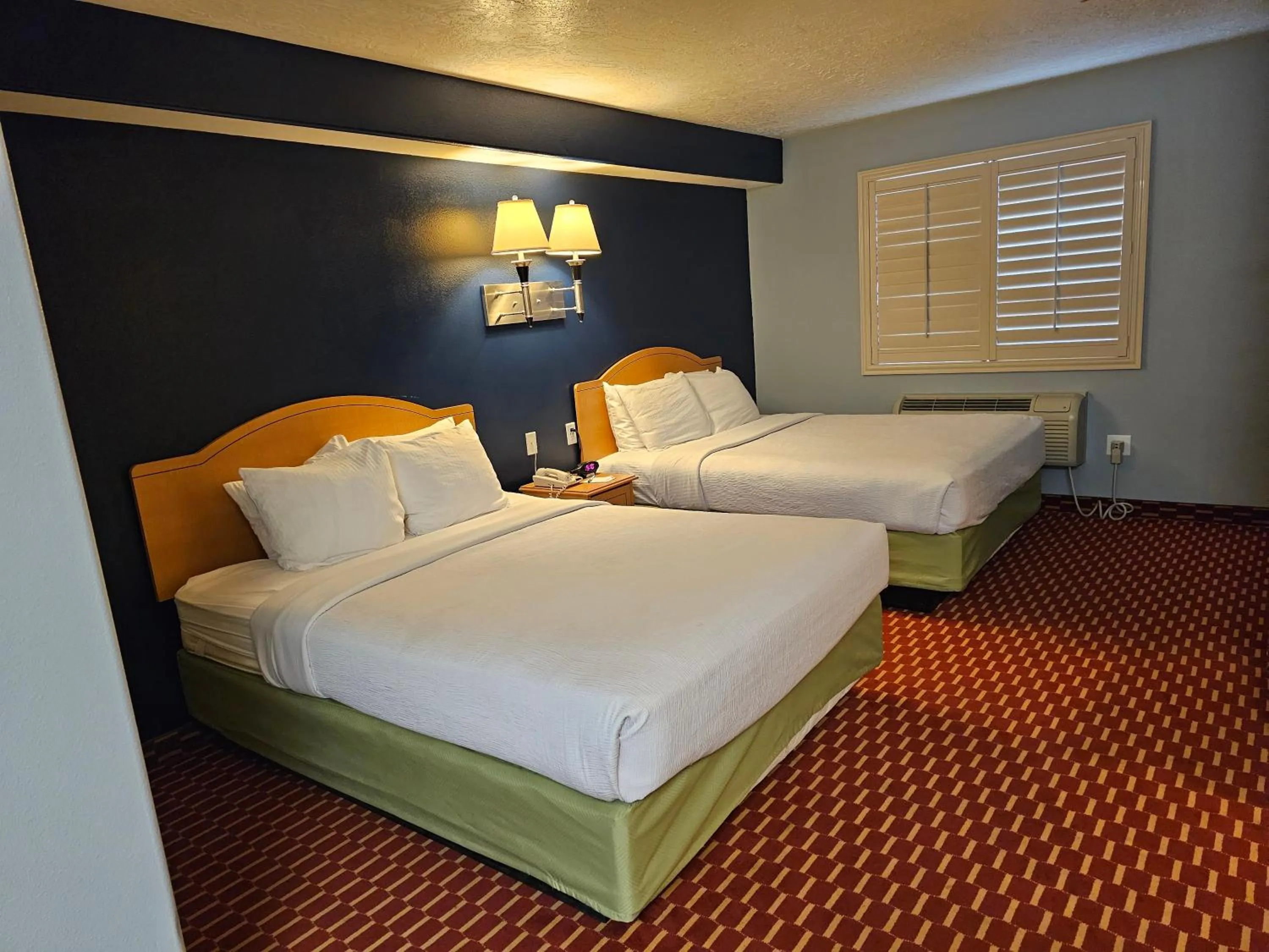 Bedroom in Executive Inn & Suites Extended Stay - Vernal