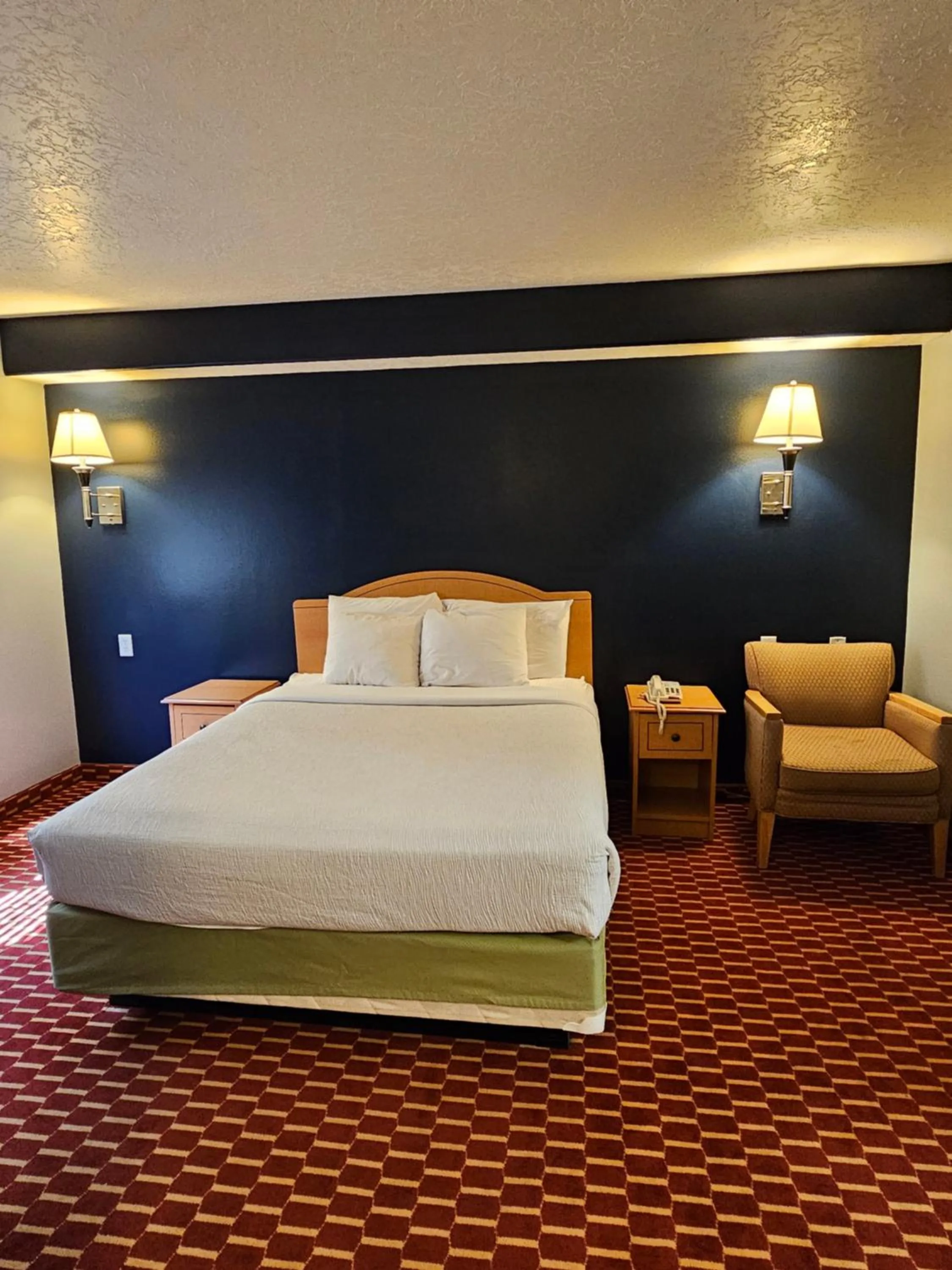 Bedroom in Executive Inn & Suites Extended Stay - Vernal