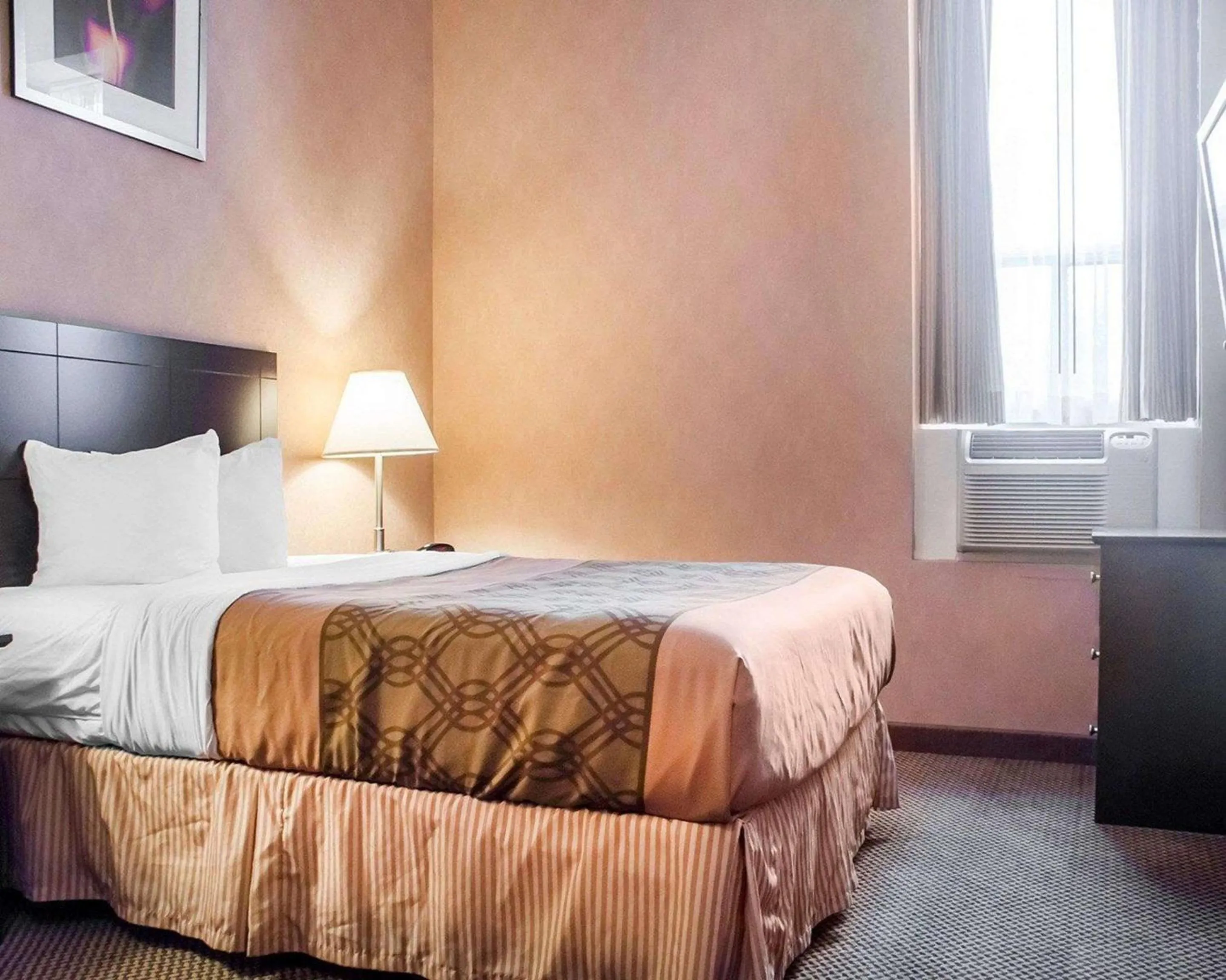 Bedroom in Woodstock Inn and Suites