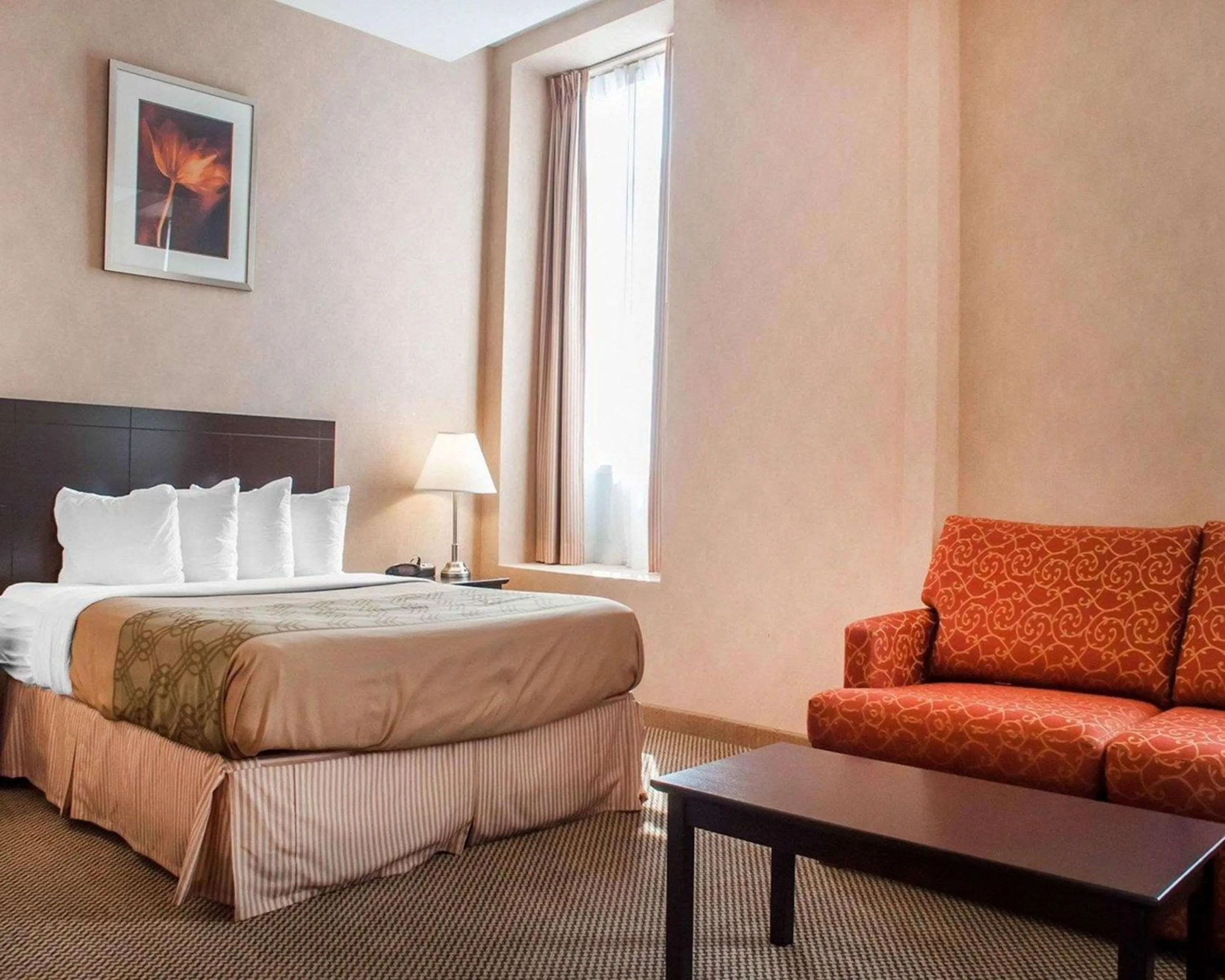 Bedroom in Woodstock Inn and Suites