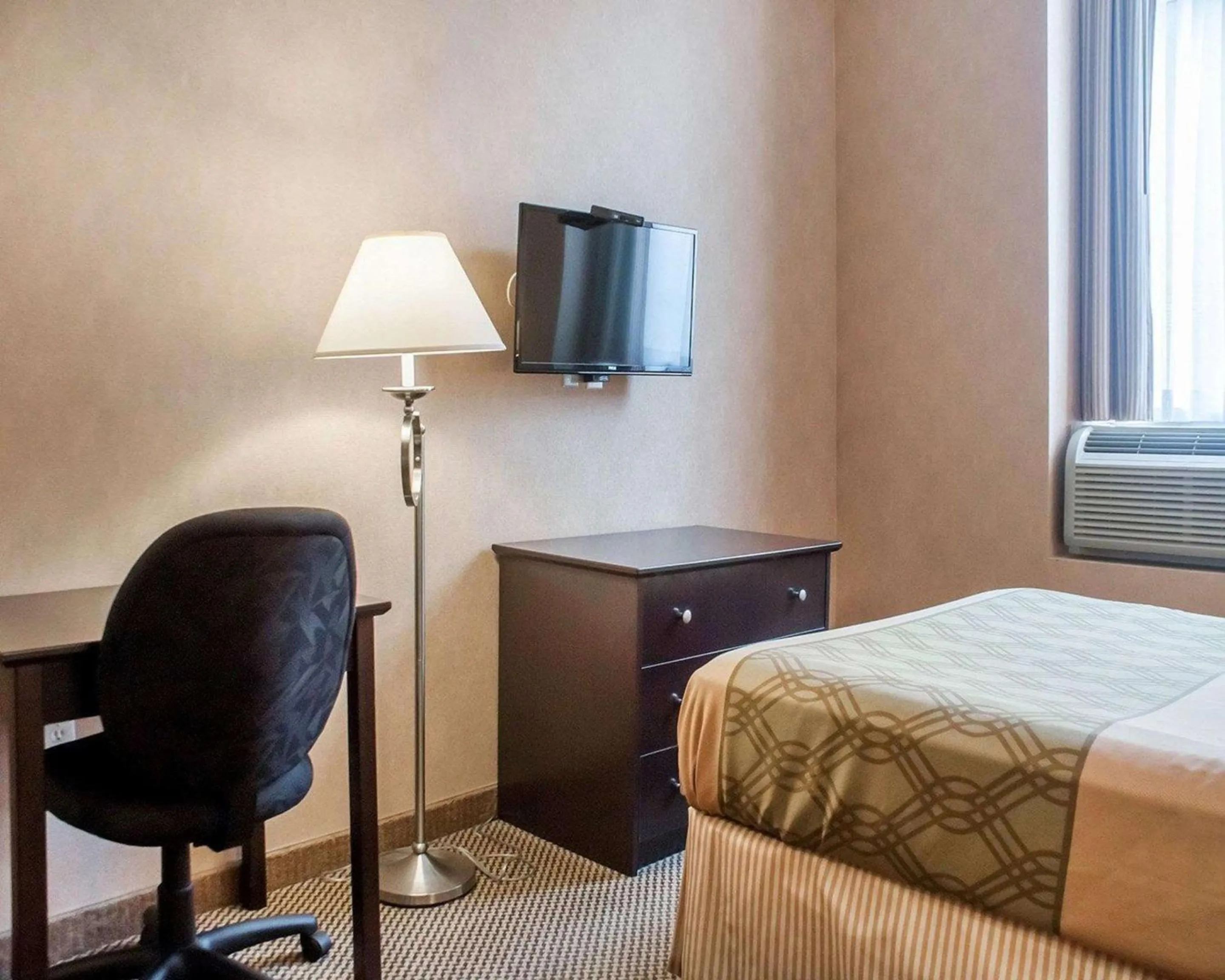 Bedroom in Woodstock Inn and Suites