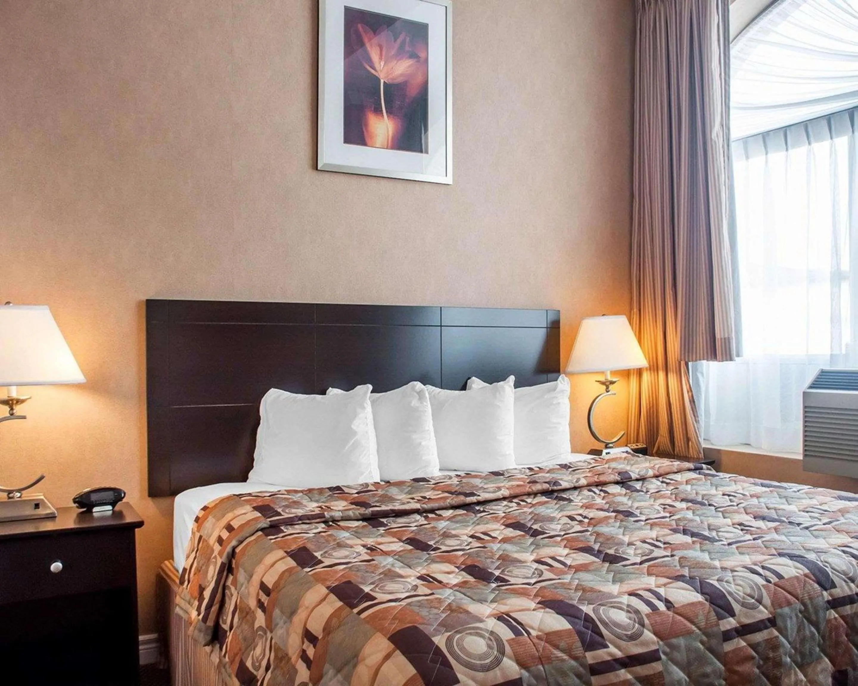 Bedroom in Woodstock Inn and Suites