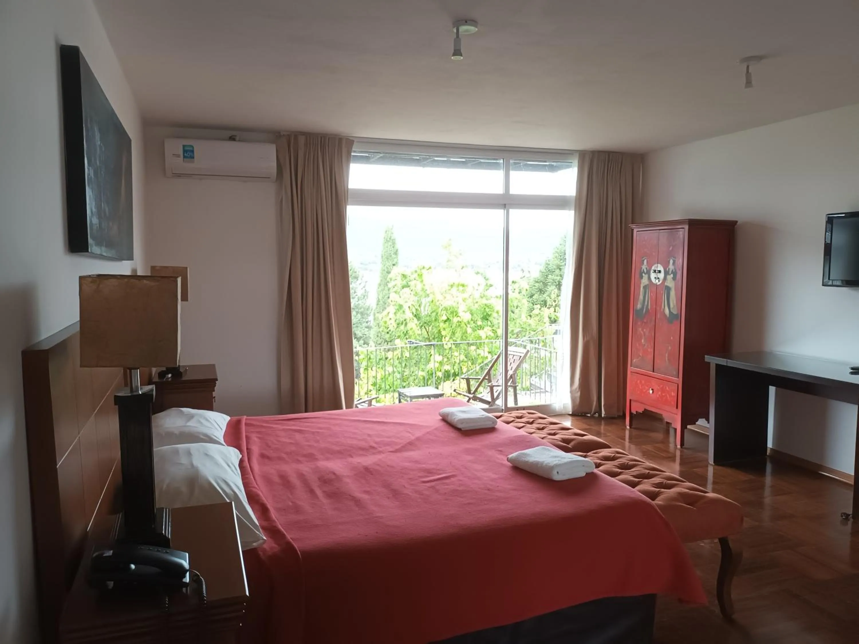 Bed in Tagore Suites Hotel