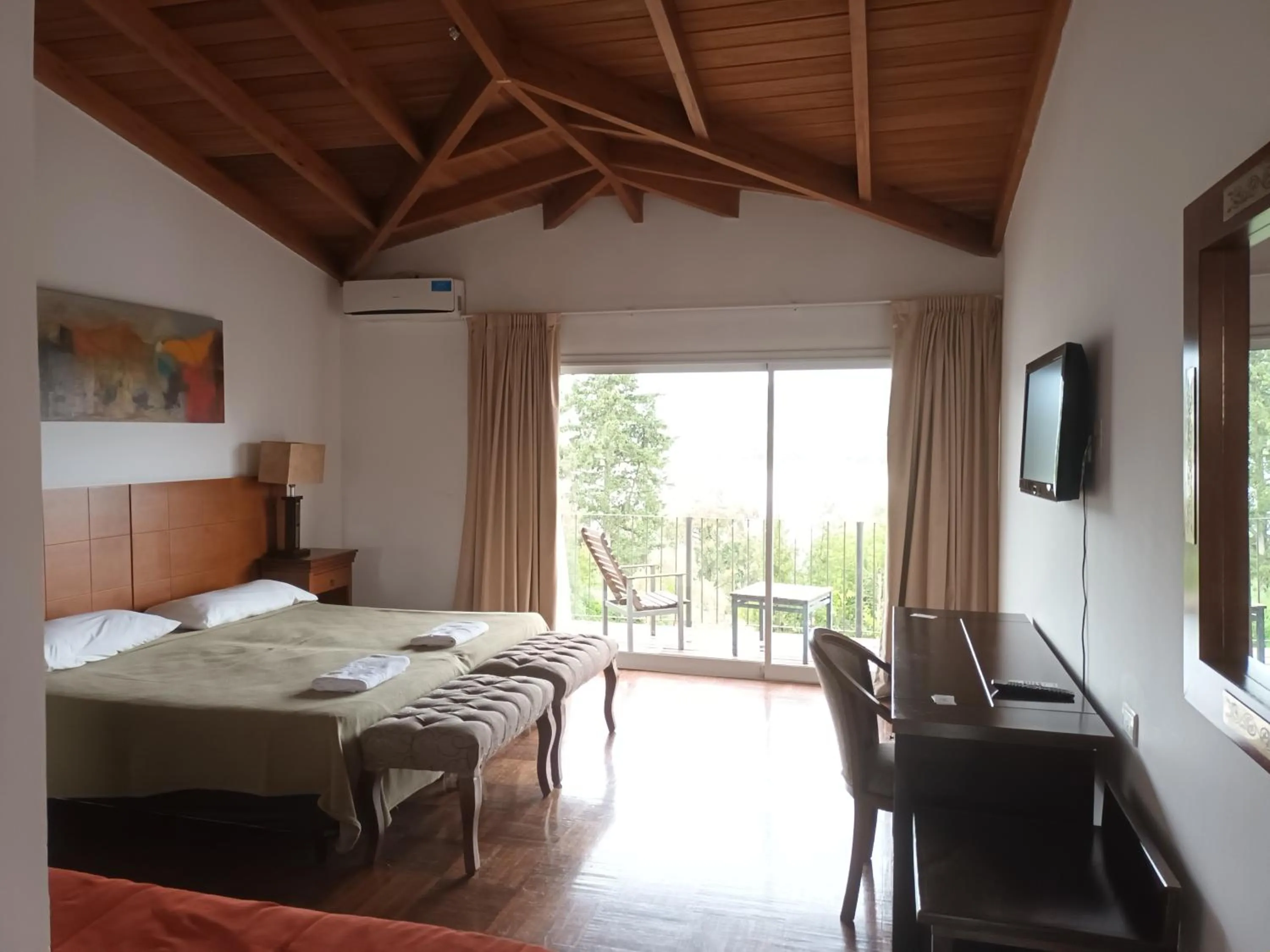 Bed in Tagore Suites Hotel