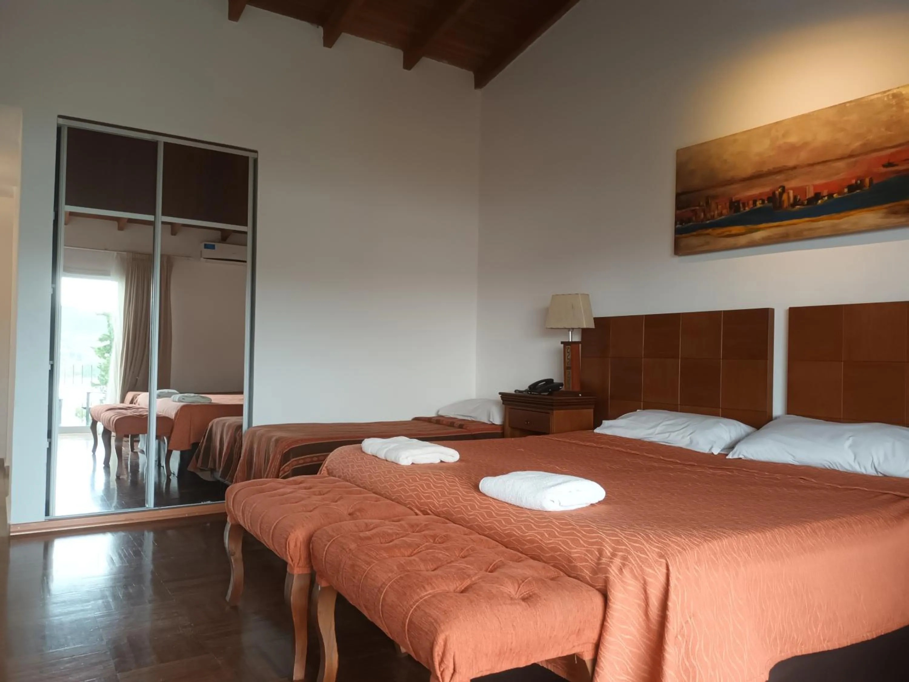 Bed in Tagore Suites Hotel