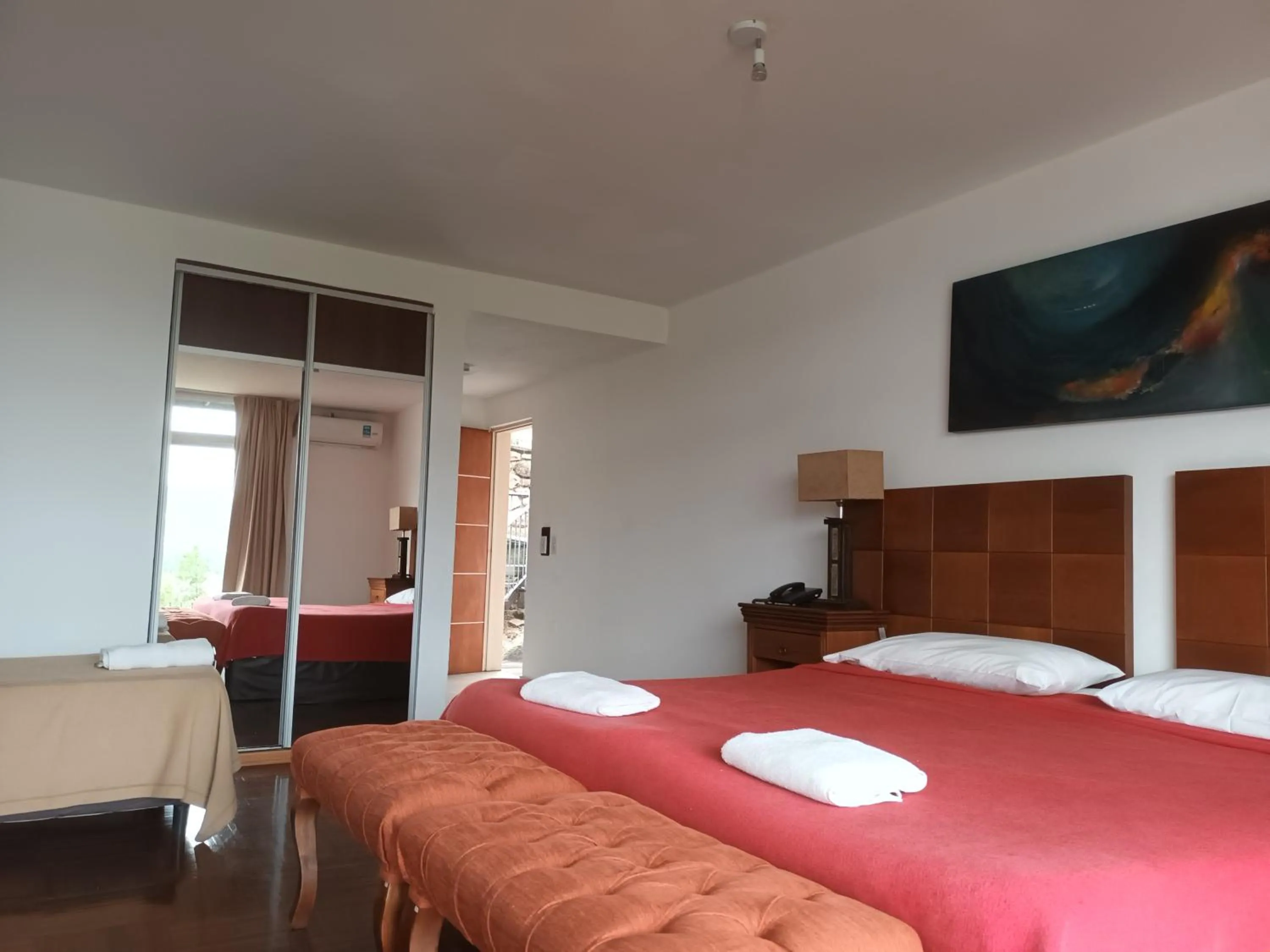 Bed in Tagore Suites Hotel