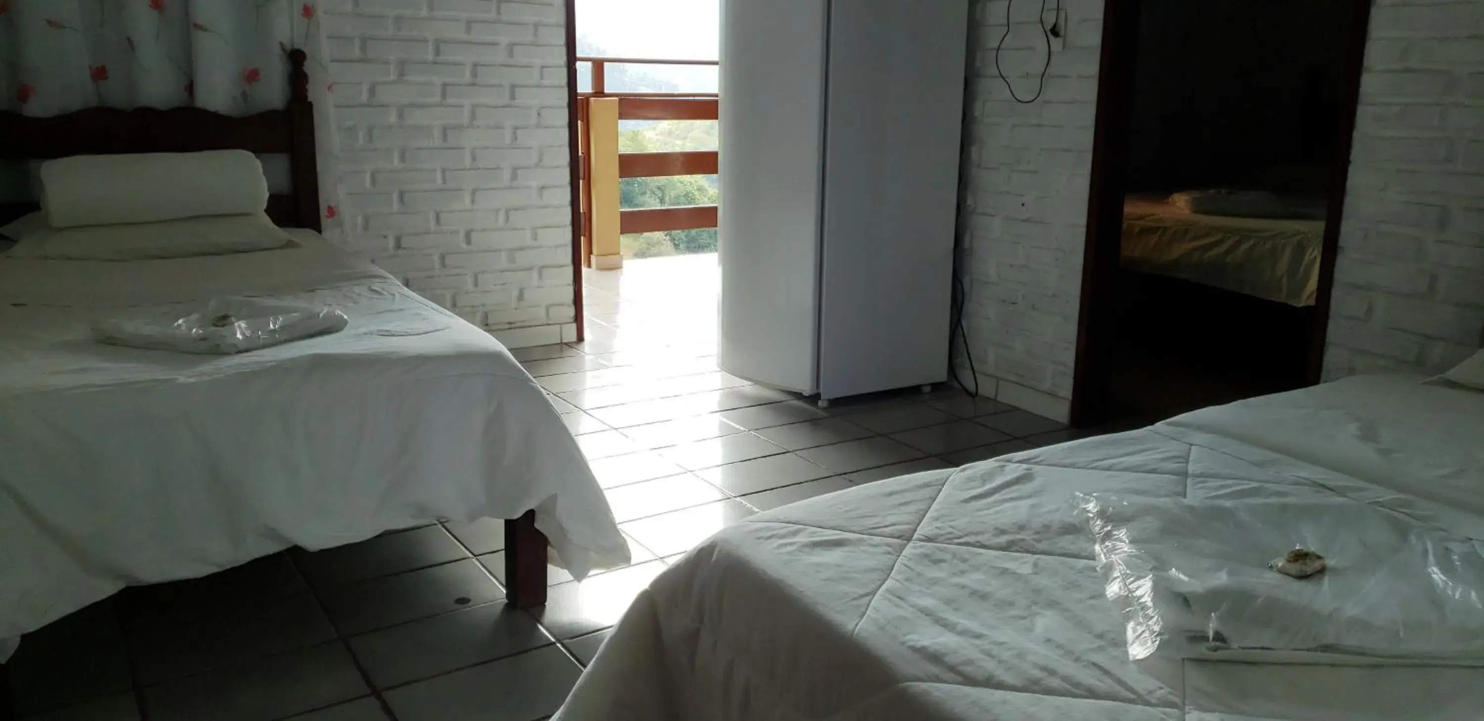 Triple Room with Balcony in Pousada na Montanha Triple Room with Balcony in Pousada na Montanha