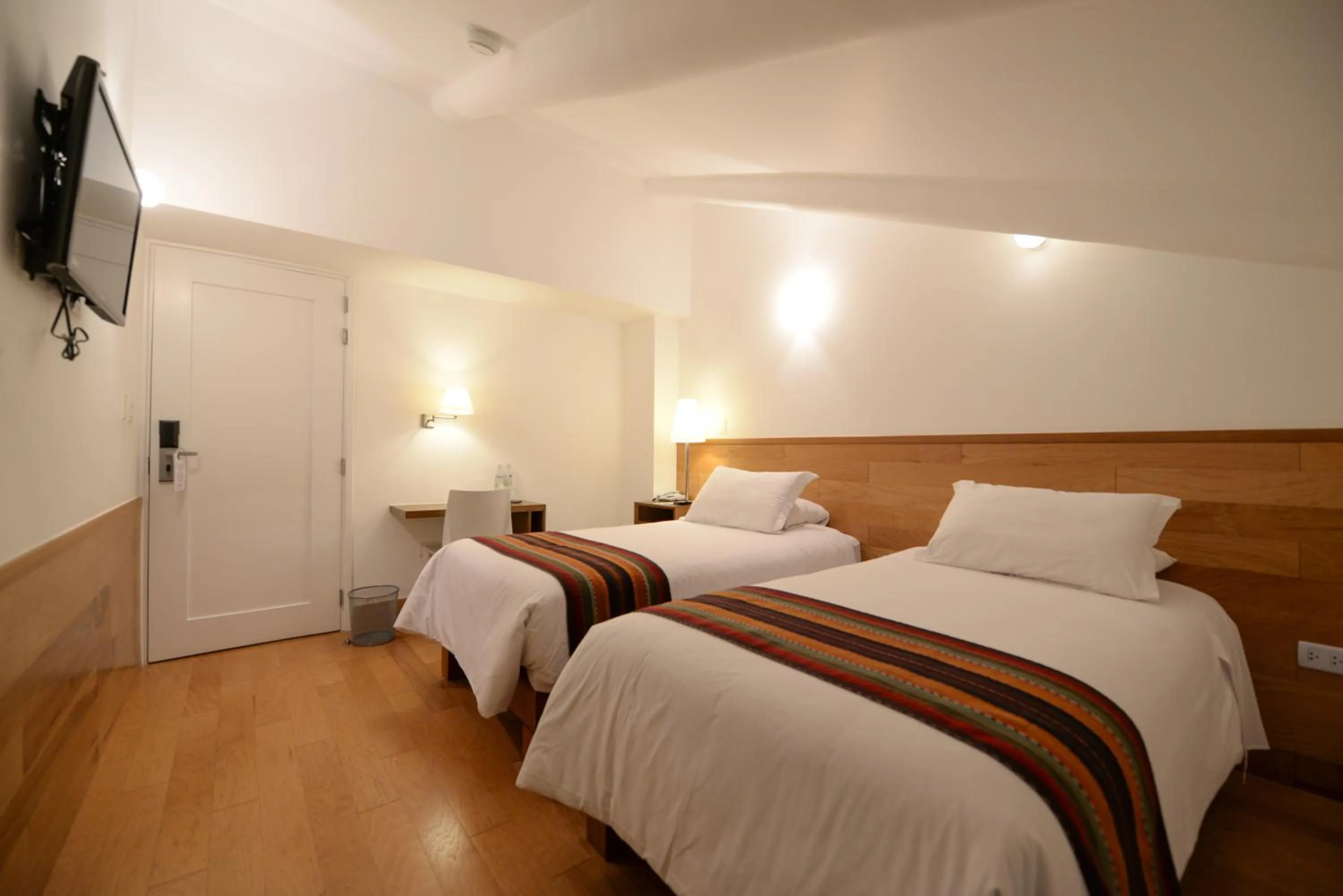 Bed in Hotel Plaza de Armas Cusco