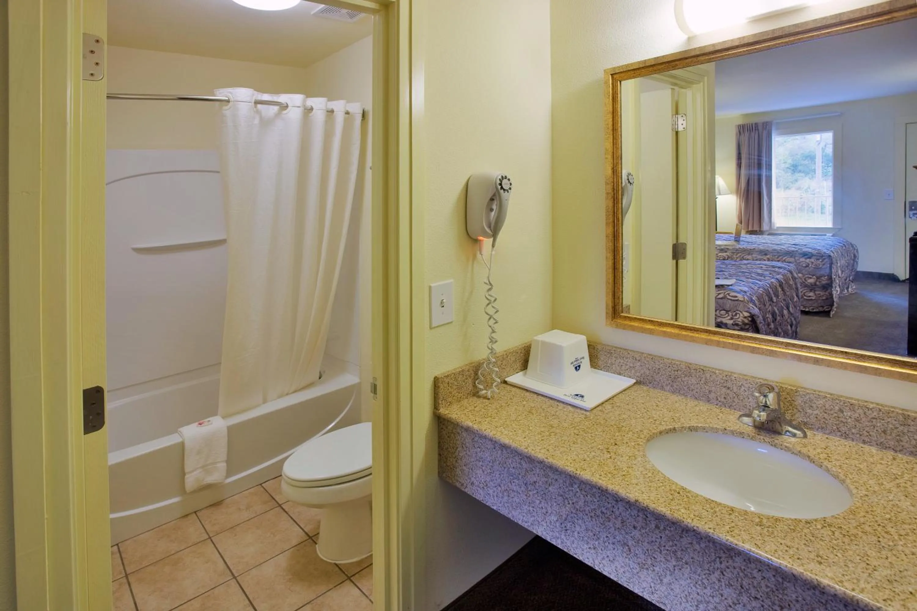 Shower in Americas Best Value Inn Near Downtown Nashville