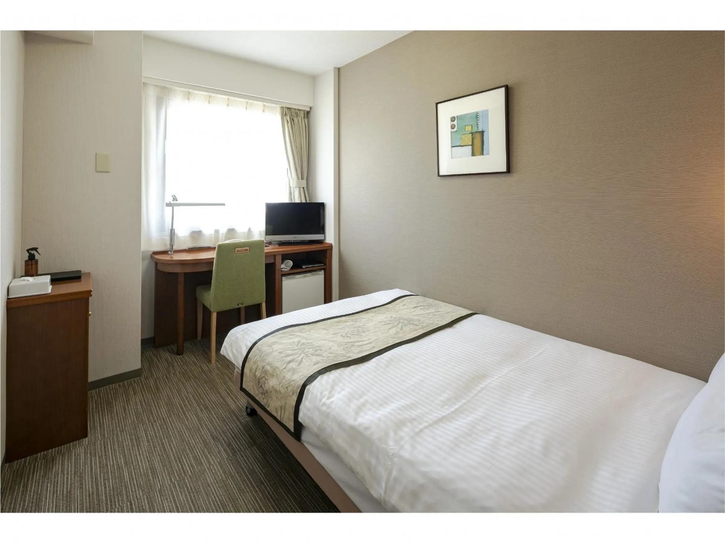 Bed in Hotel Hokke Club Kumamoto