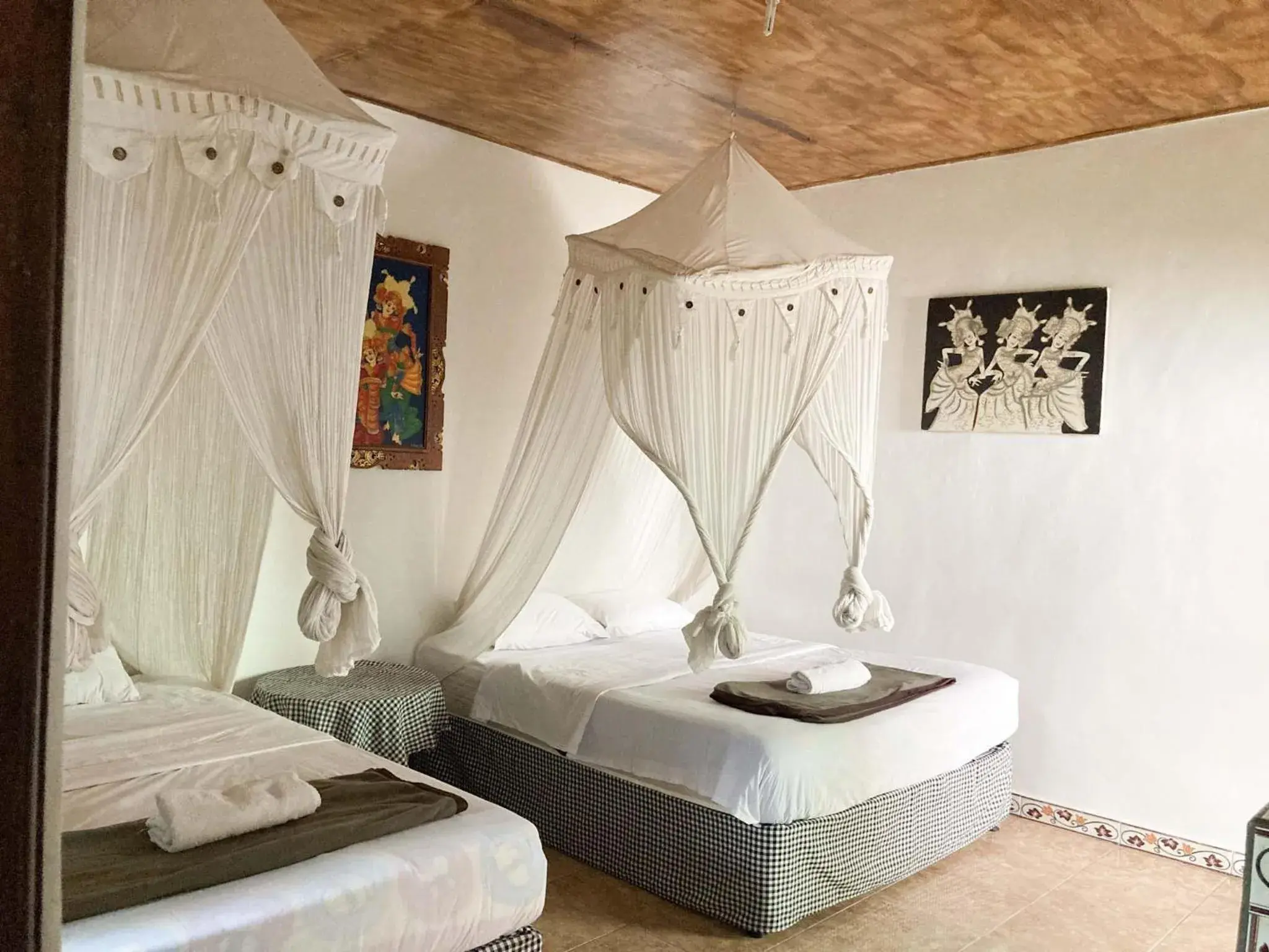 Budget Twin Room in Taman Ayu Homestay Munduk Mitra RedDoorz Budget Twin Room in Taman Ayu Homestay Munduk Mitra RedDoorz