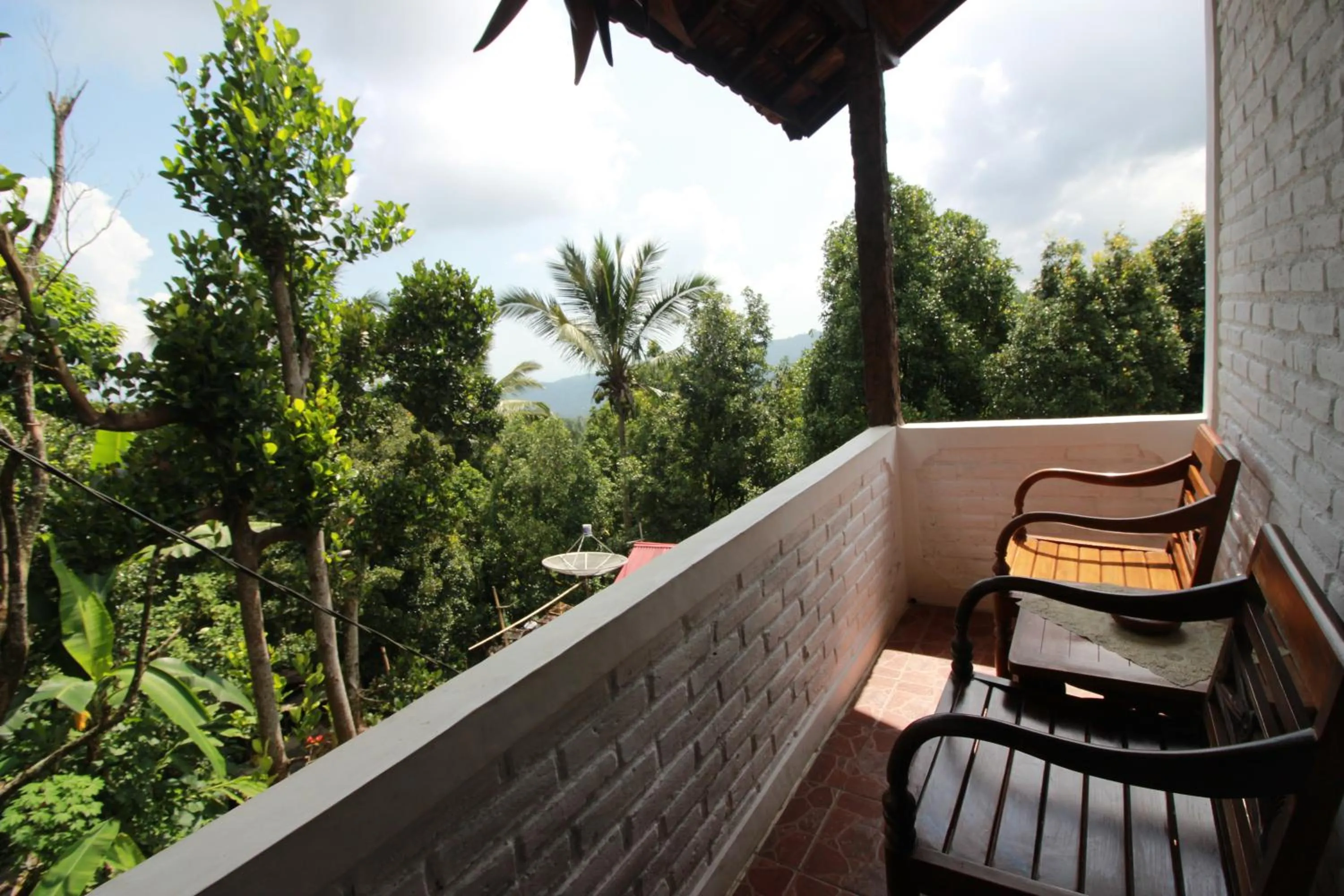 Balcony/Terrace in Taman Ayu Homestay Munduk Mitra RedDoorz