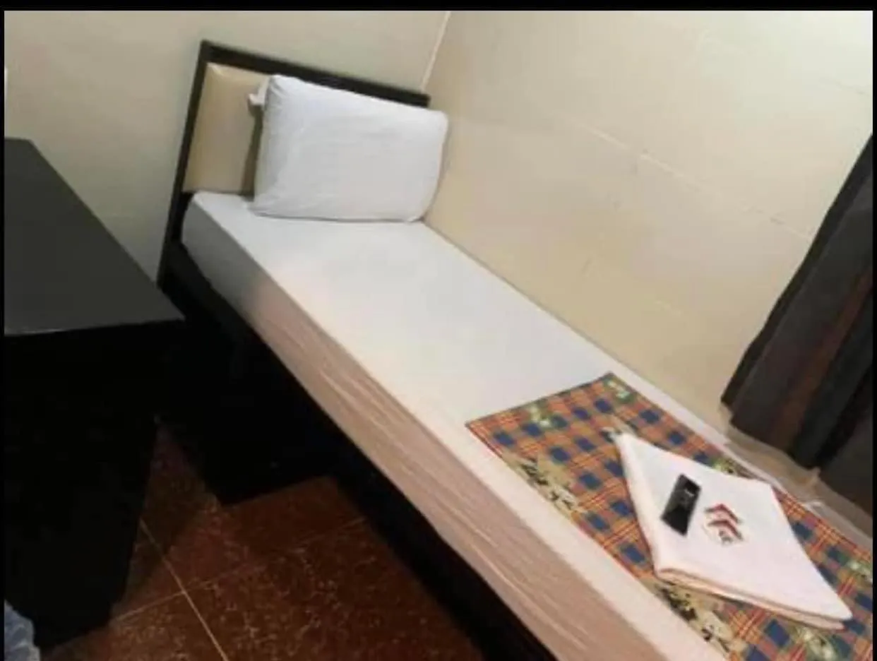 Bed in Nagaland Guesthouse