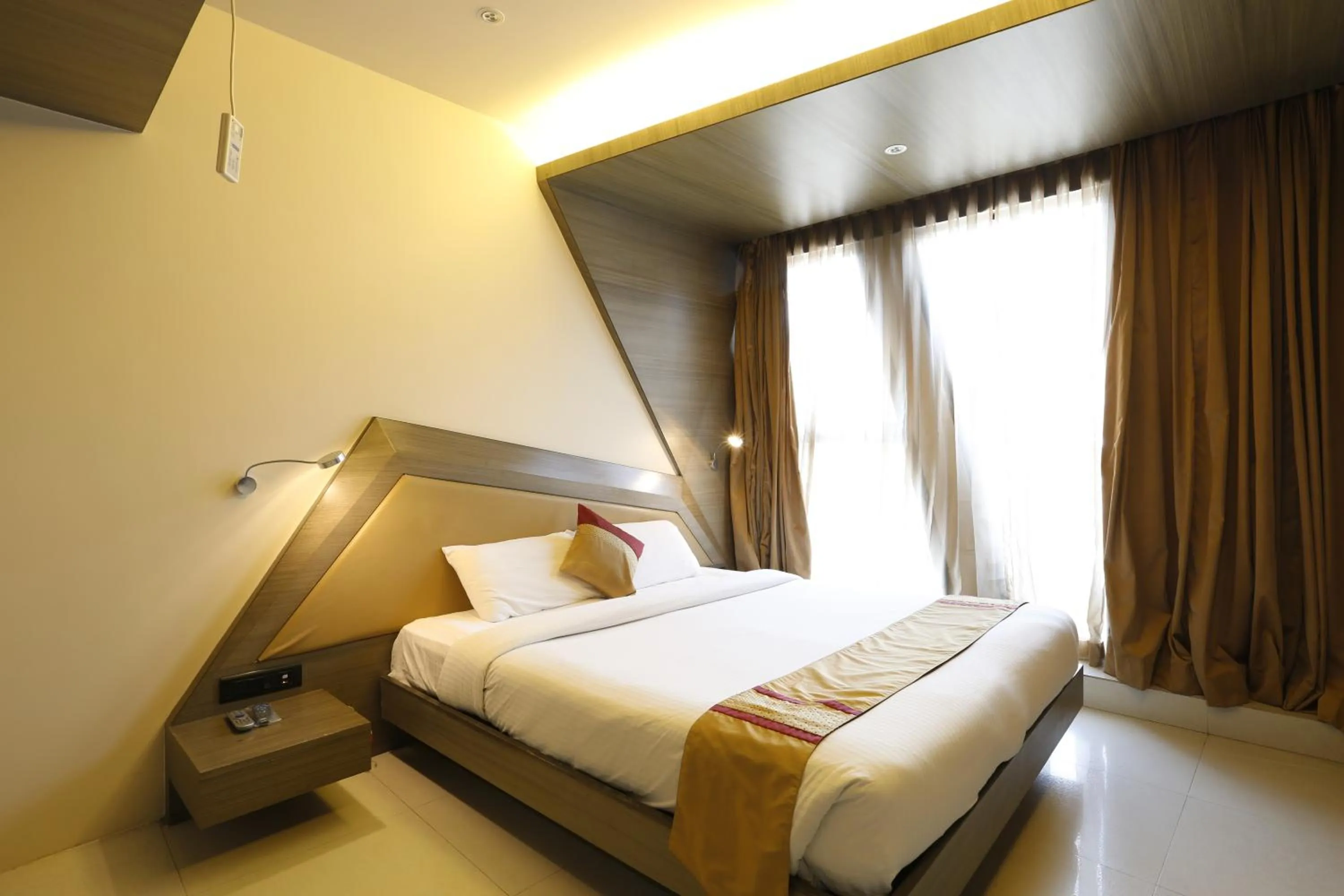 Bed in Dragonfly Hotel - The Art Hotel