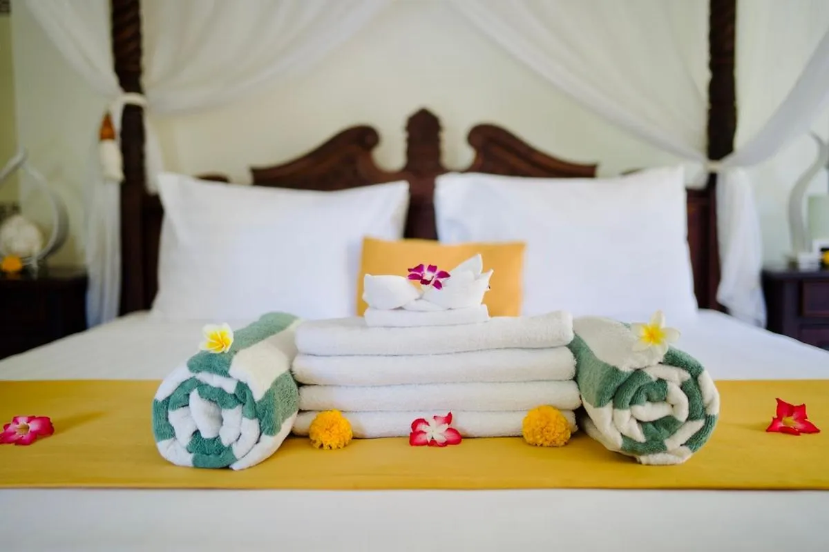 Bed in Poinciana Resort