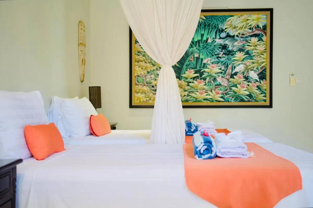 Bed in Poinciana Resort