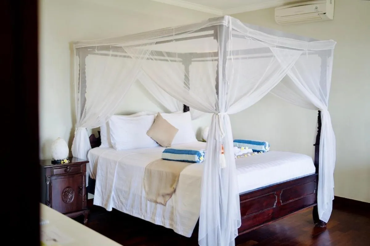 Bed in Poinciana Resort