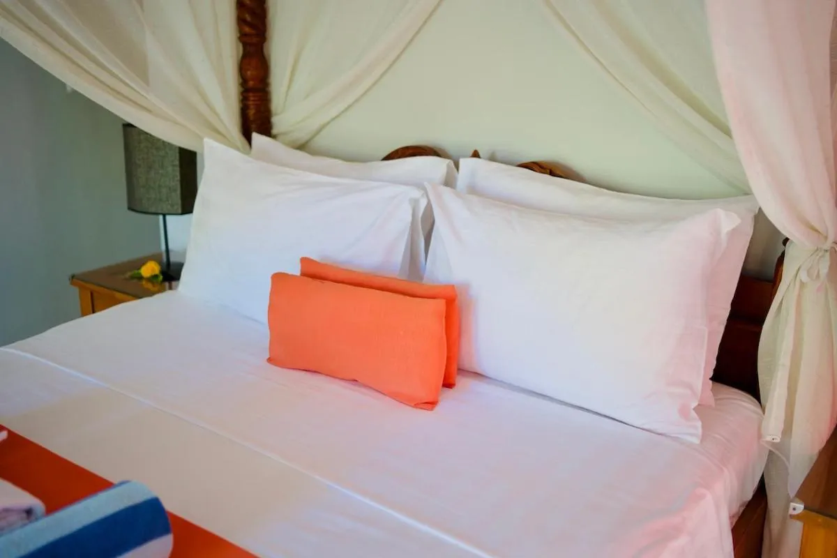 Bed in Poinciana Resort