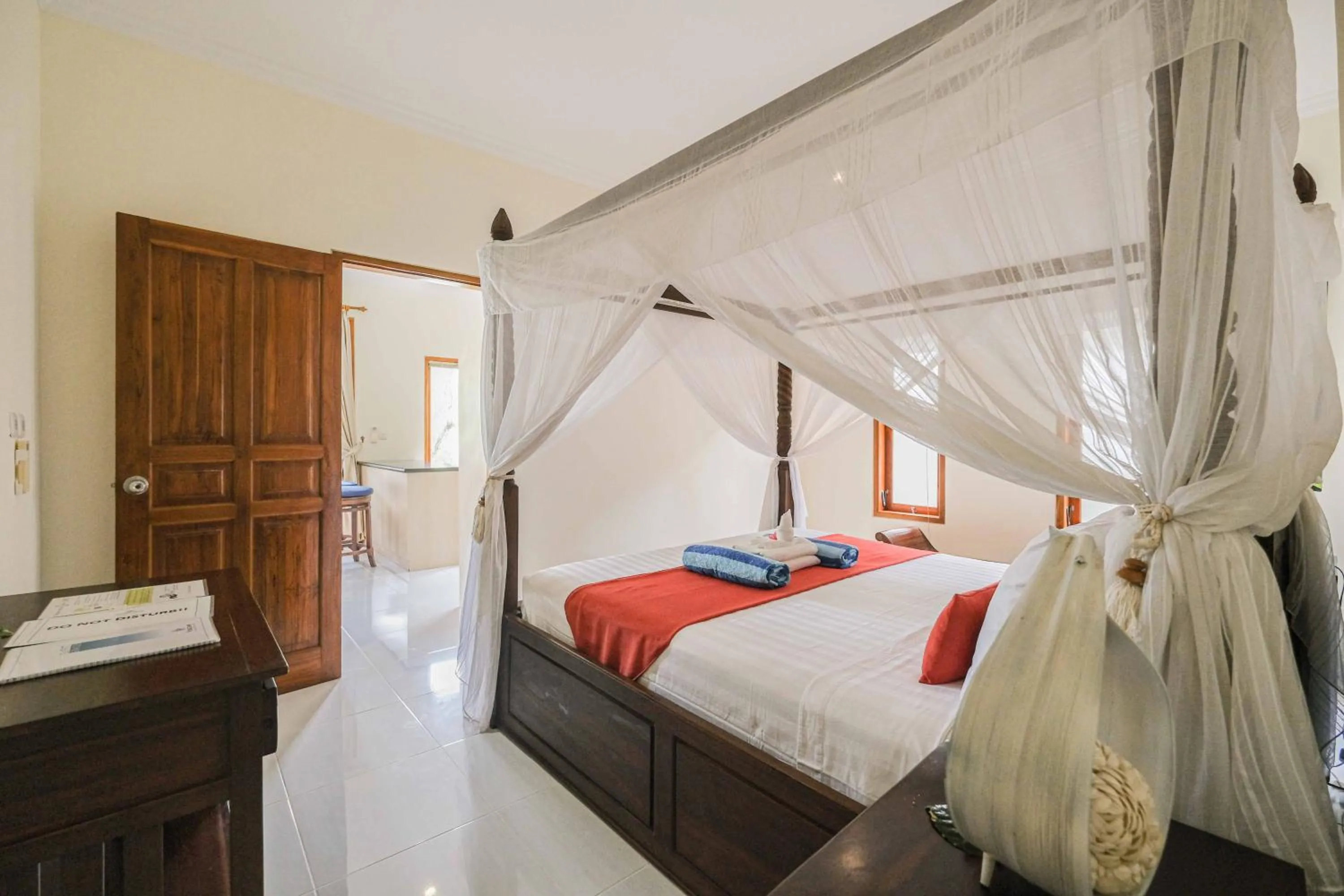 Bed in Poinciana Resort