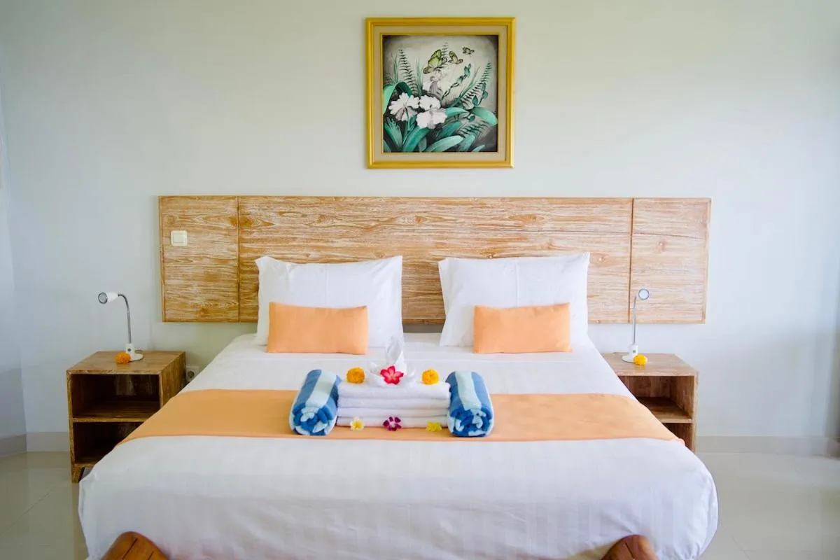 Bed in Poinciana Resort