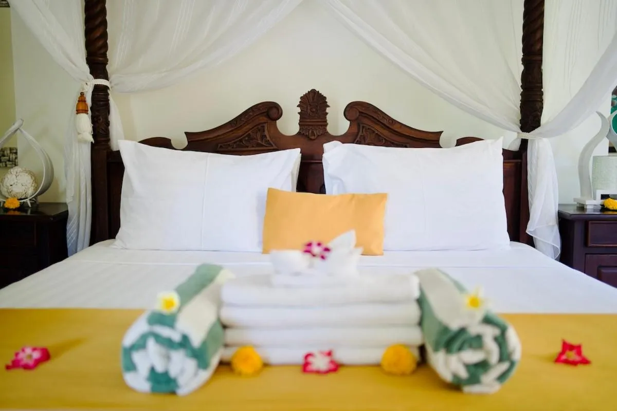 Bed in Poinciana Resort