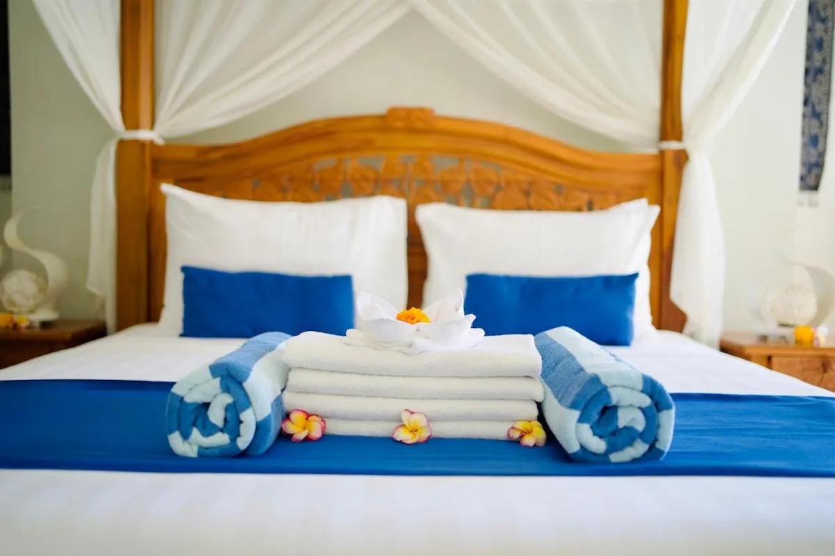 Bed in Poinciana Resort