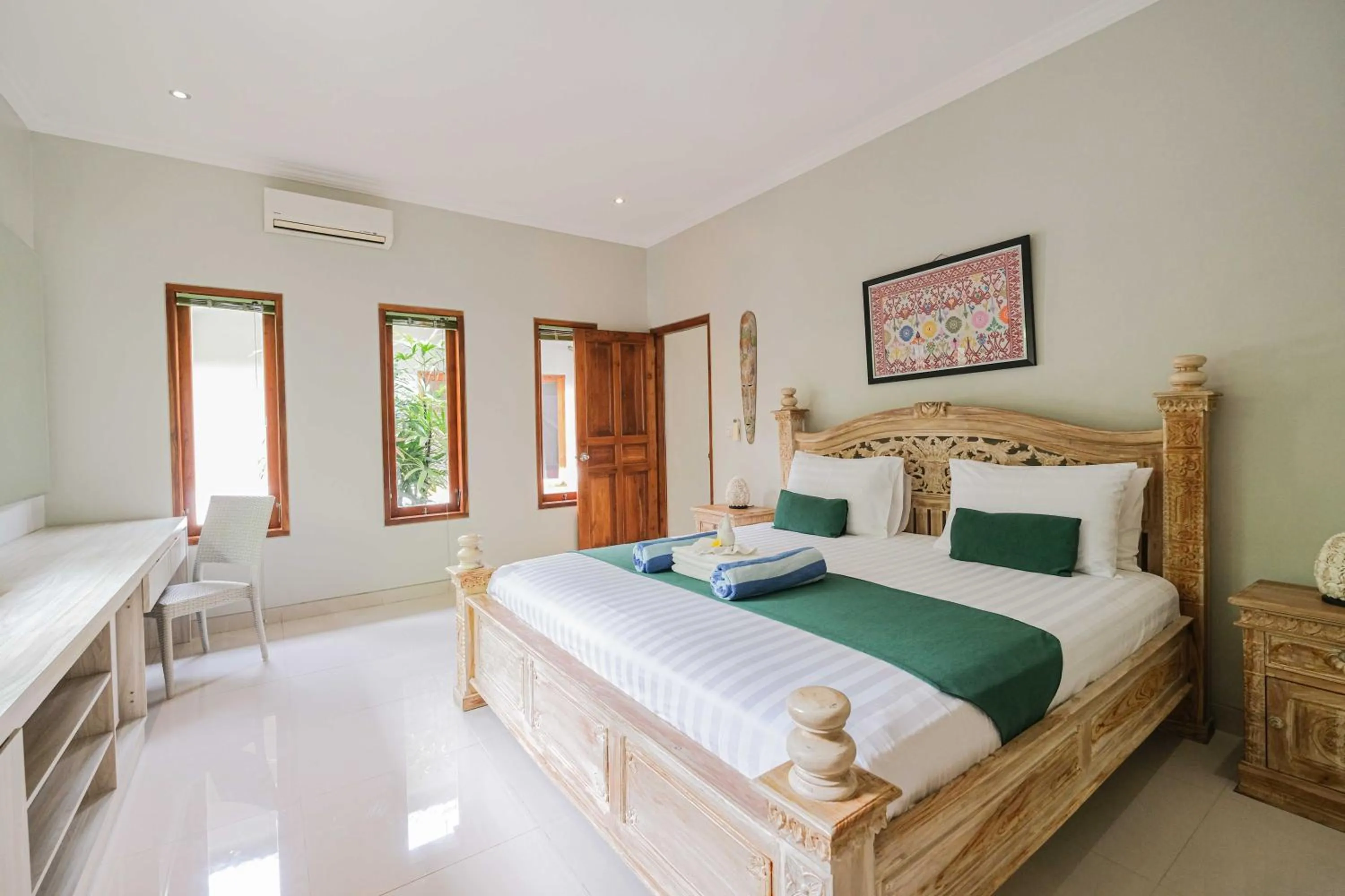 Bed in Poinciana Resort