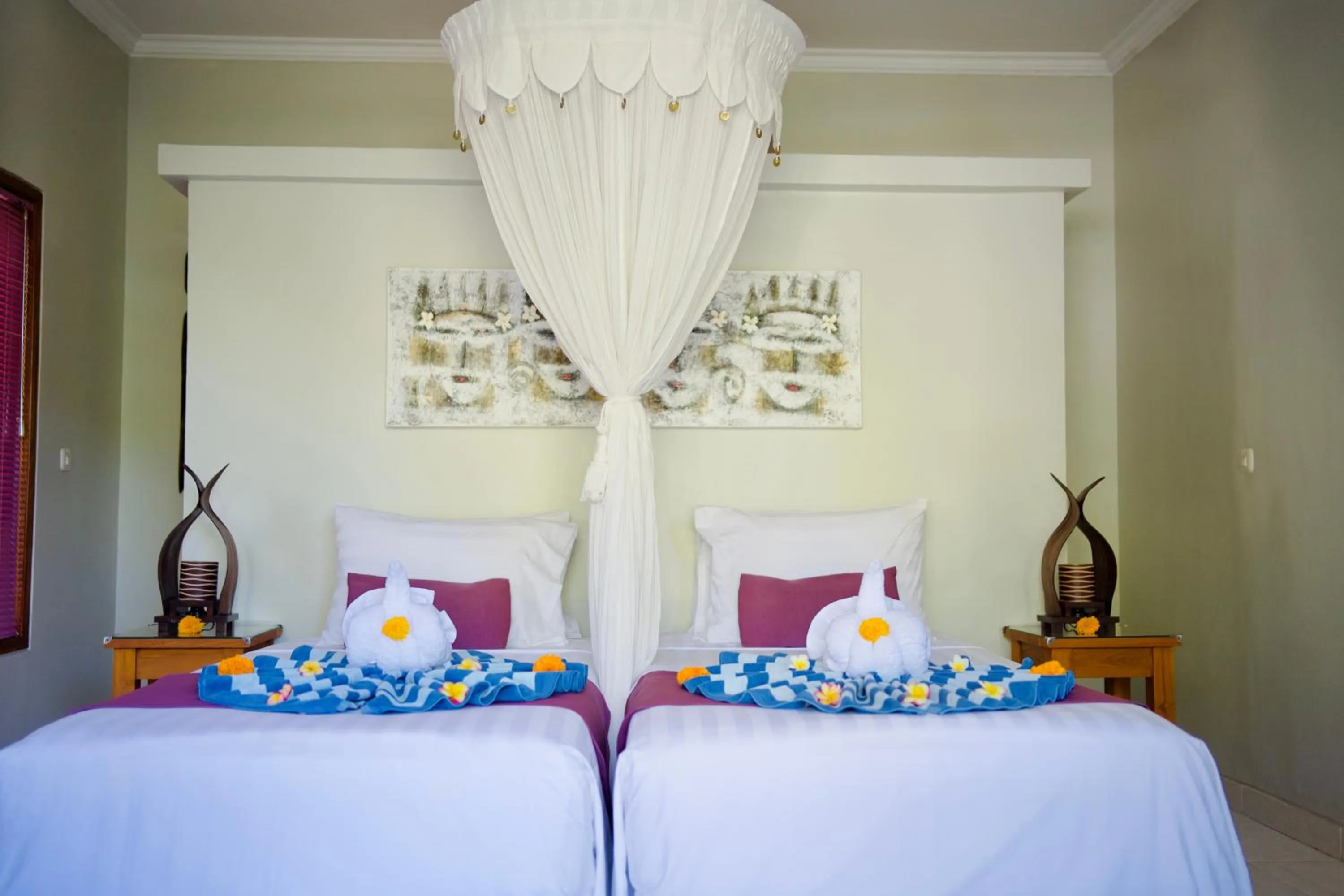 Bed in Poinciana Resort