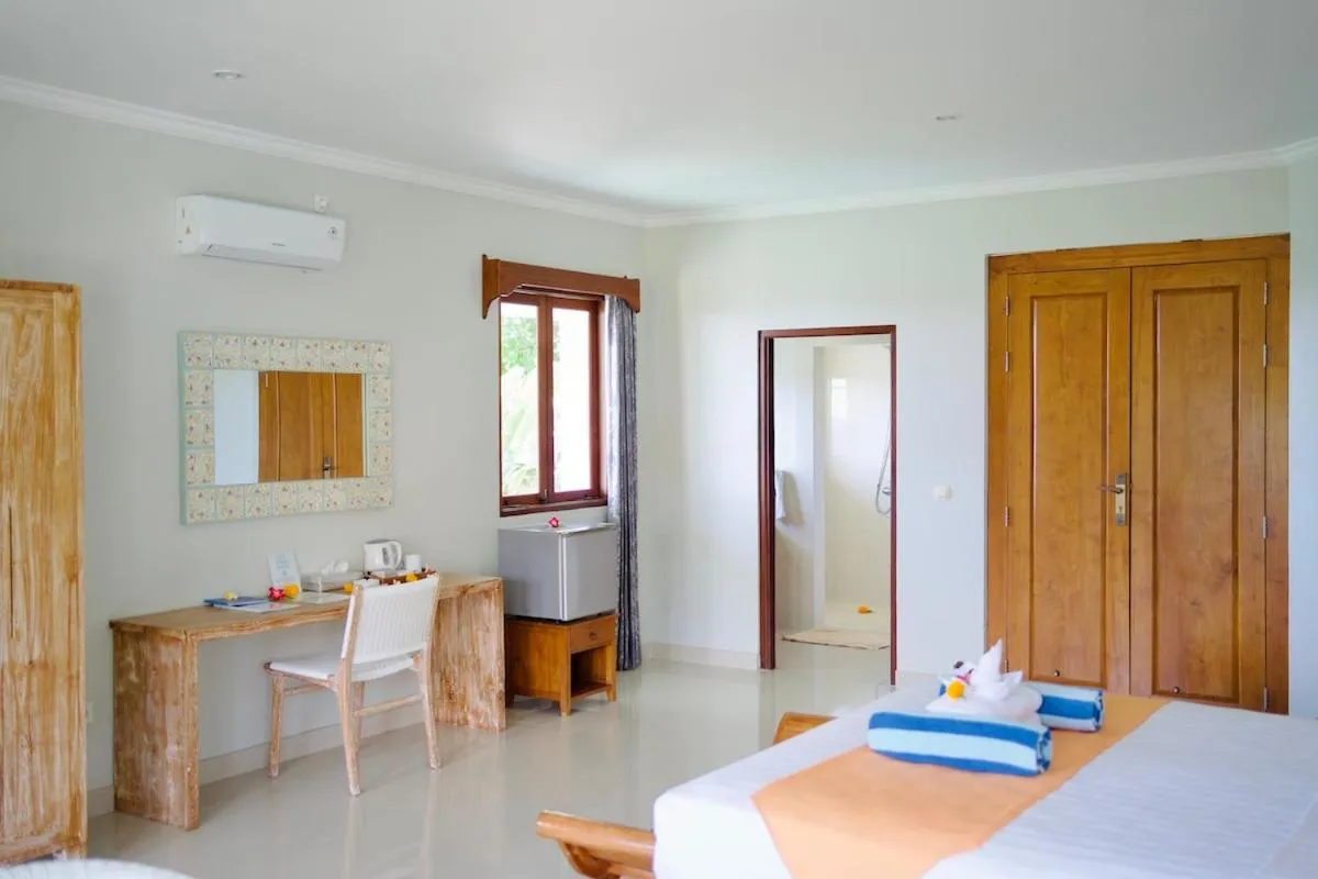 Bed in Poinciana Resort