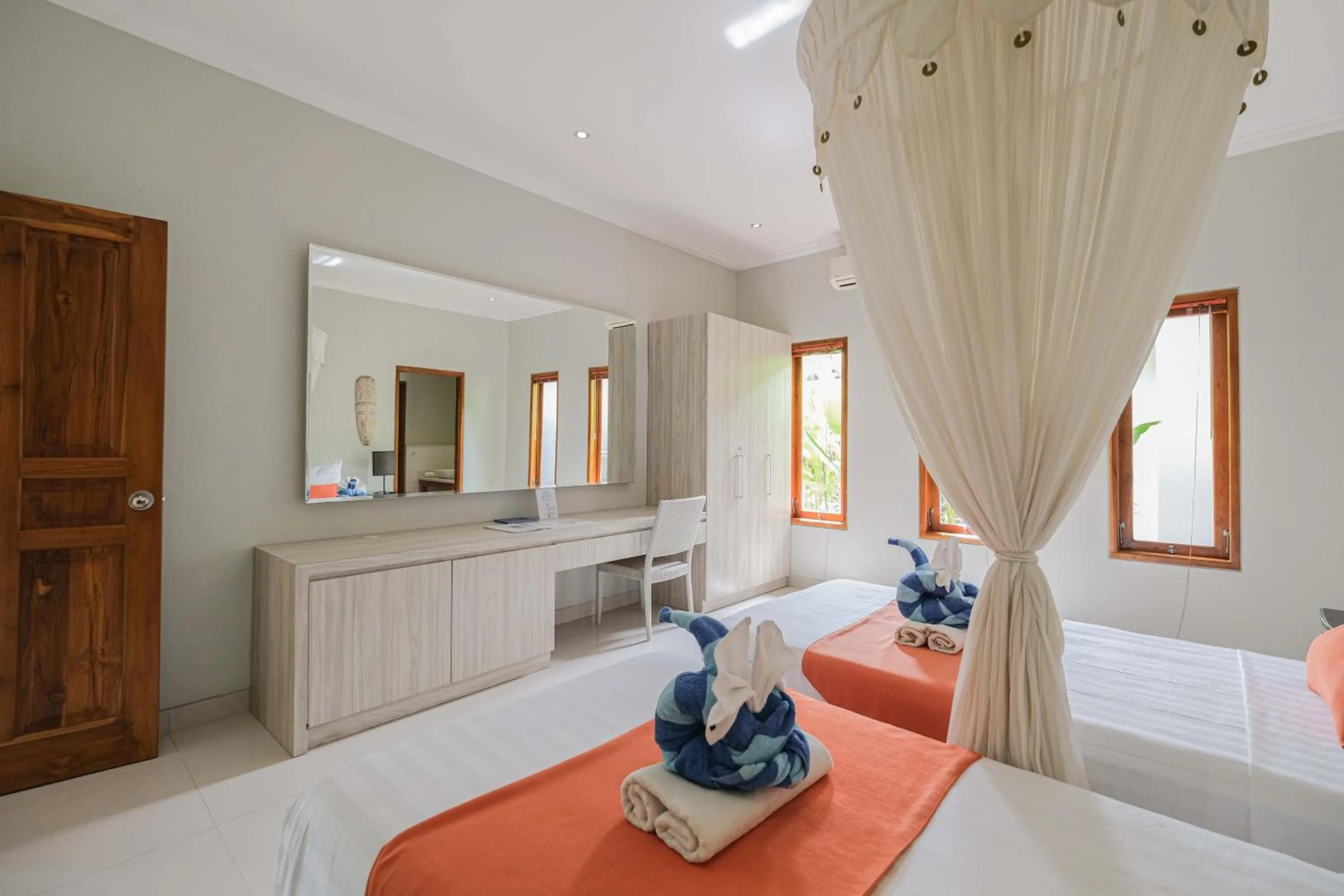 Bed in Poinciana Resort