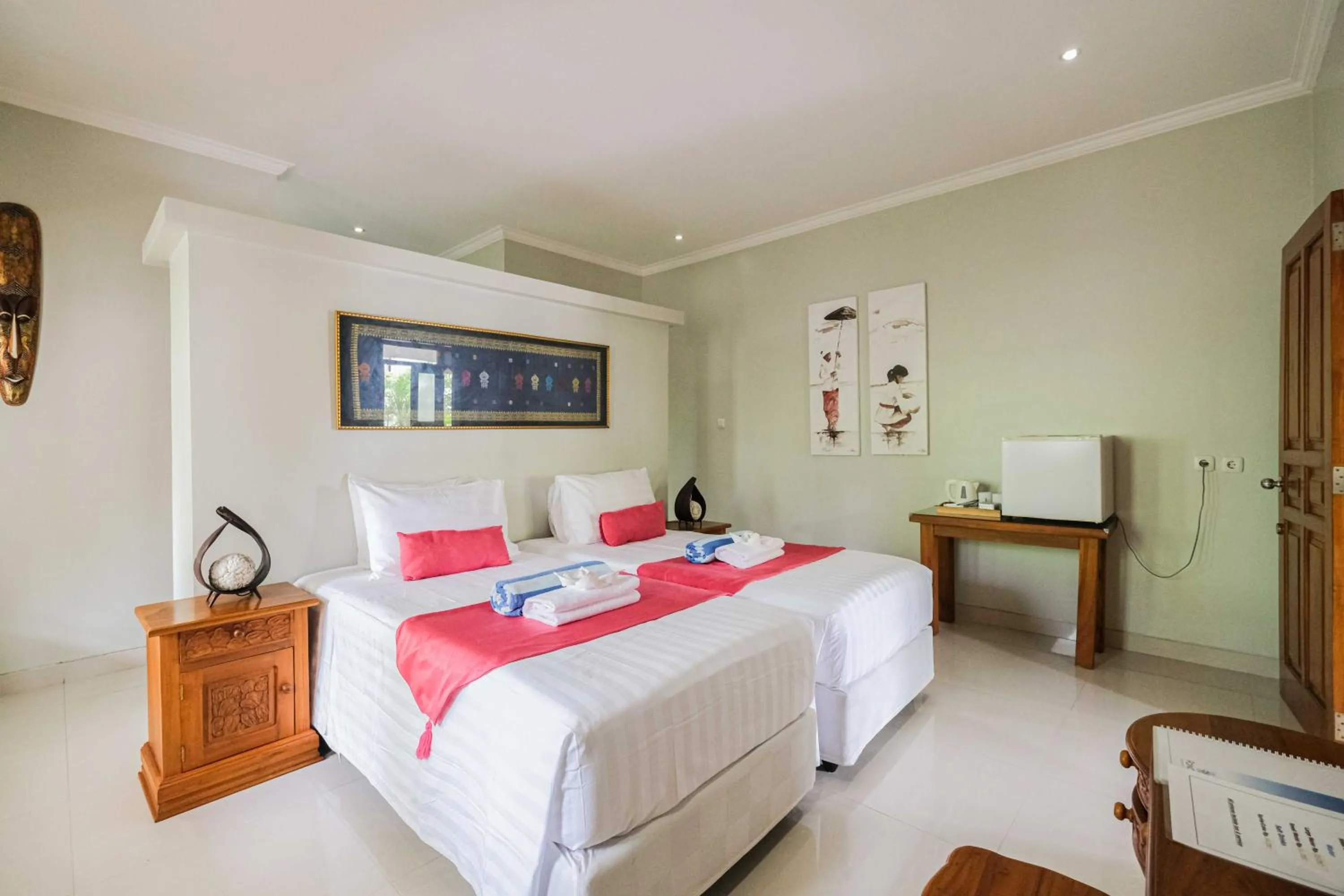 Bed in Poinciana Resort