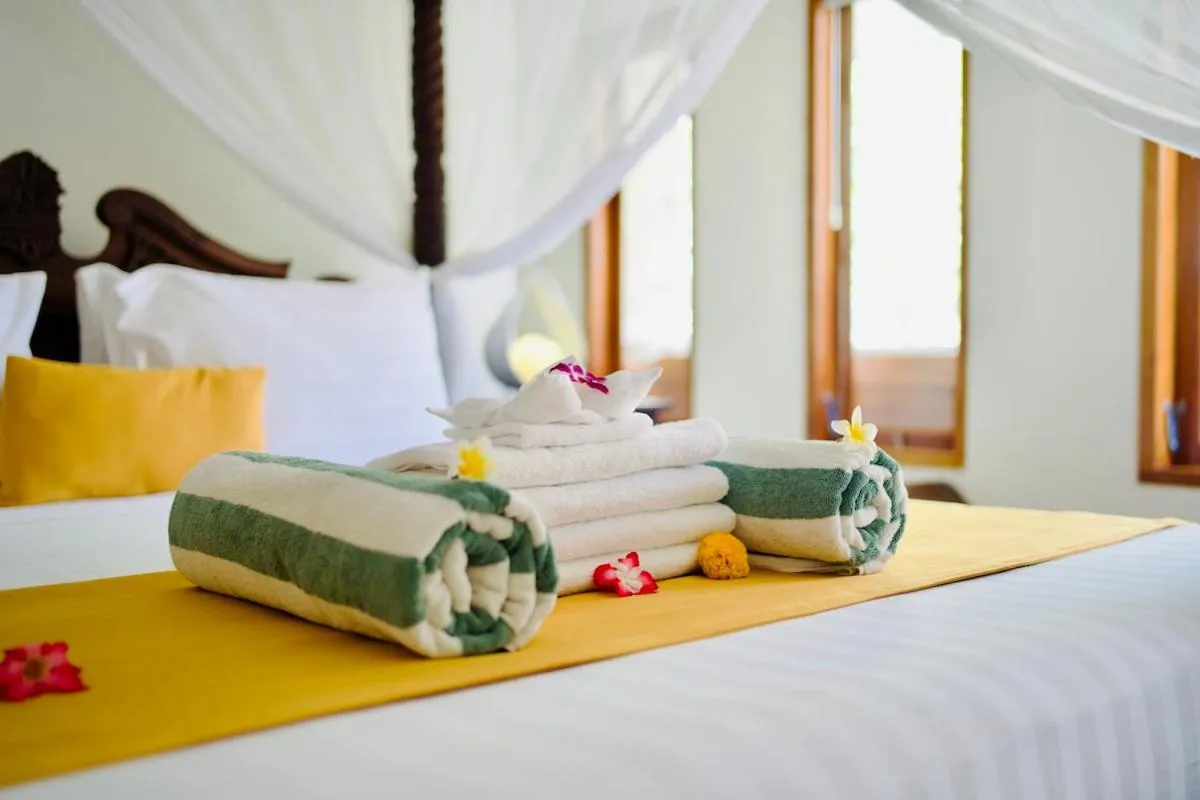 Bed in Poinciana Resort