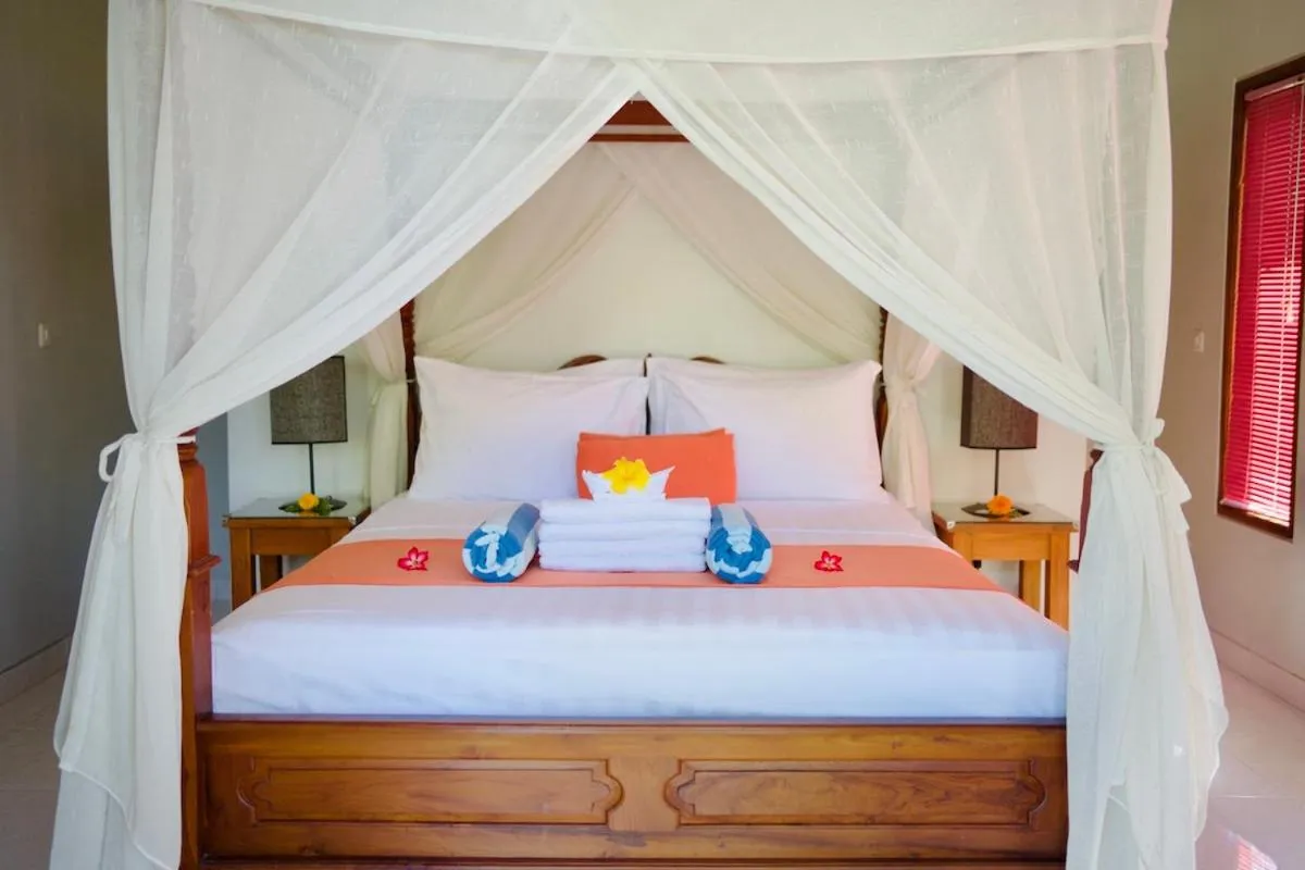 Bed in Poinciana Resort