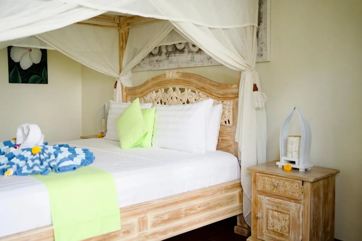 Bed in Poinciana Resort