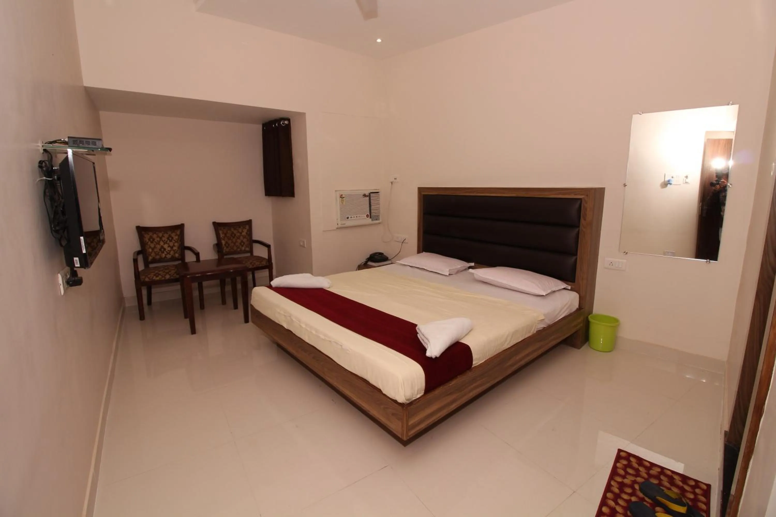 Photo of the whole room, Bed in Hotel Meera