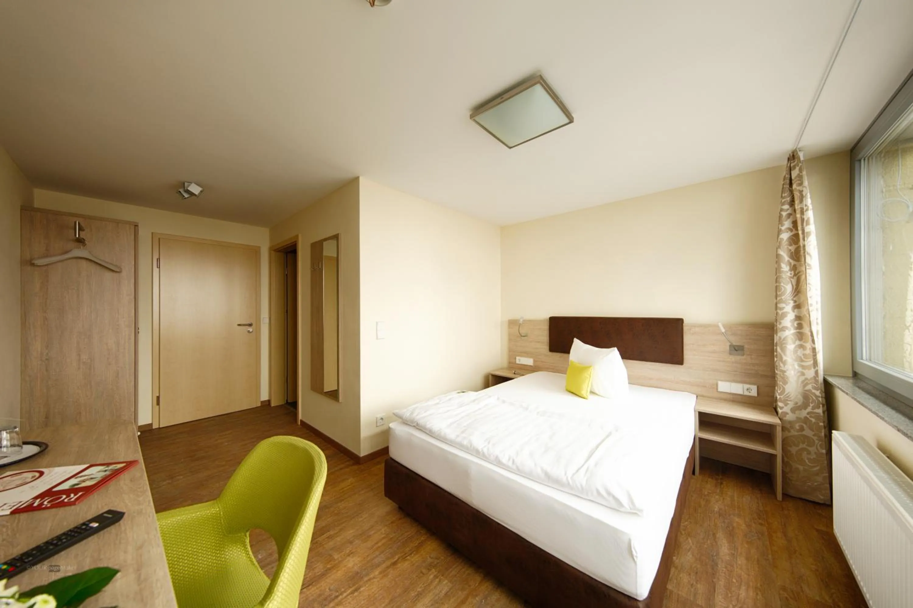 Photo of the whole room, Bed in Hotel-Restaurant Römerhof Superior