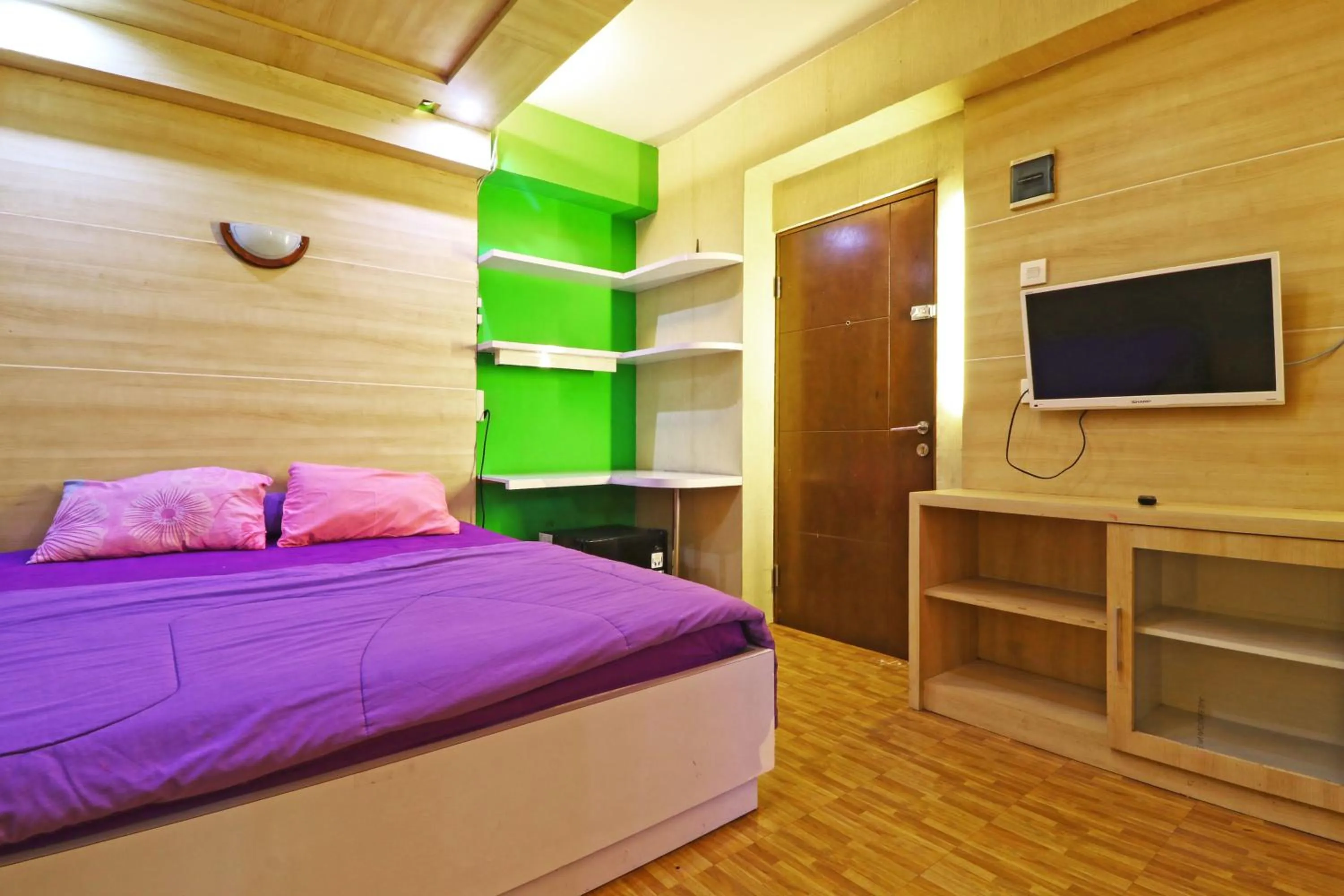 Bed in Inkubus Gateway Apartment Ahmad Yani by Ridwan