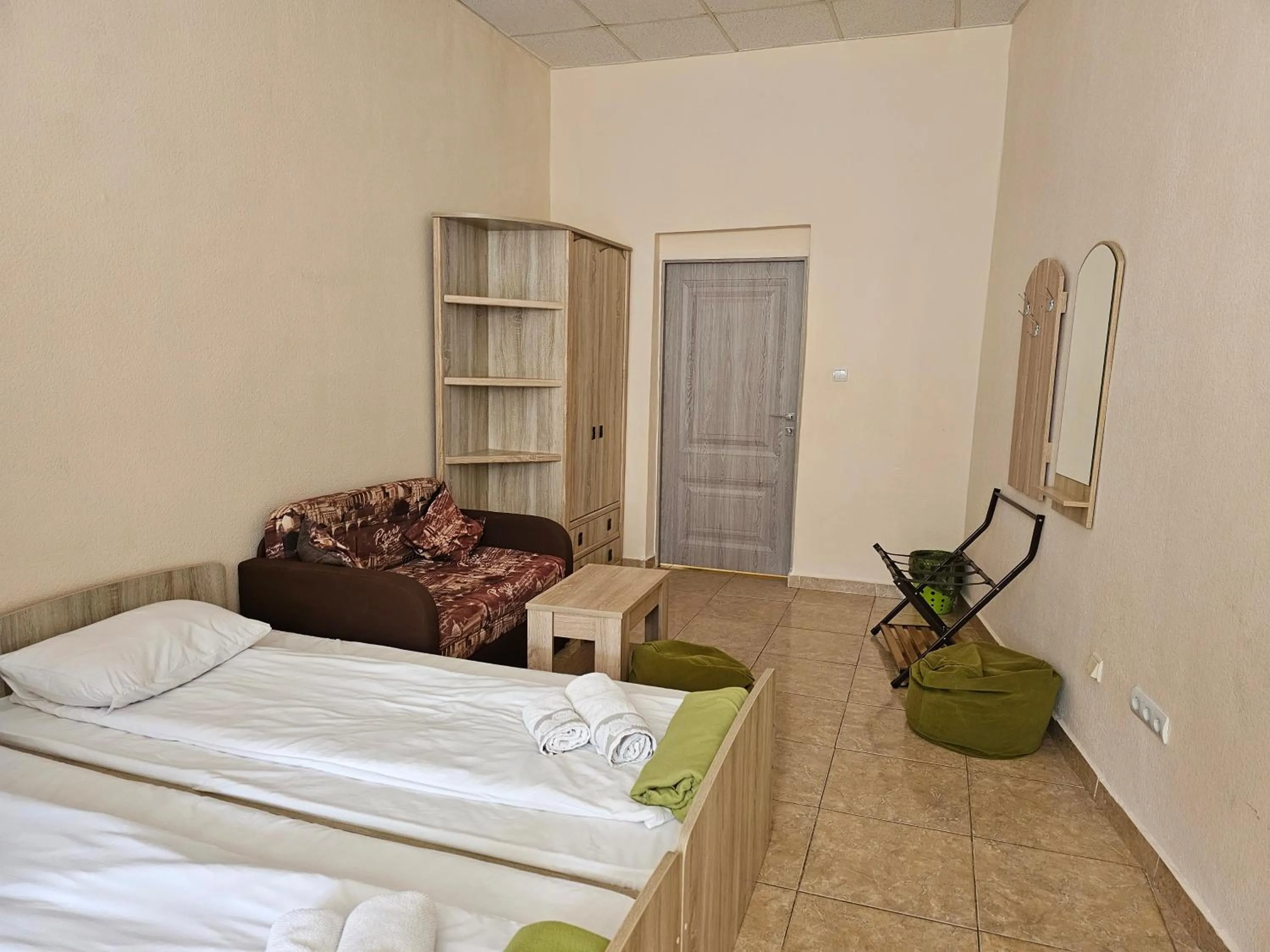 Superior Quadruple Room with Shared Bathroom in Coin Apartments & Poshtel