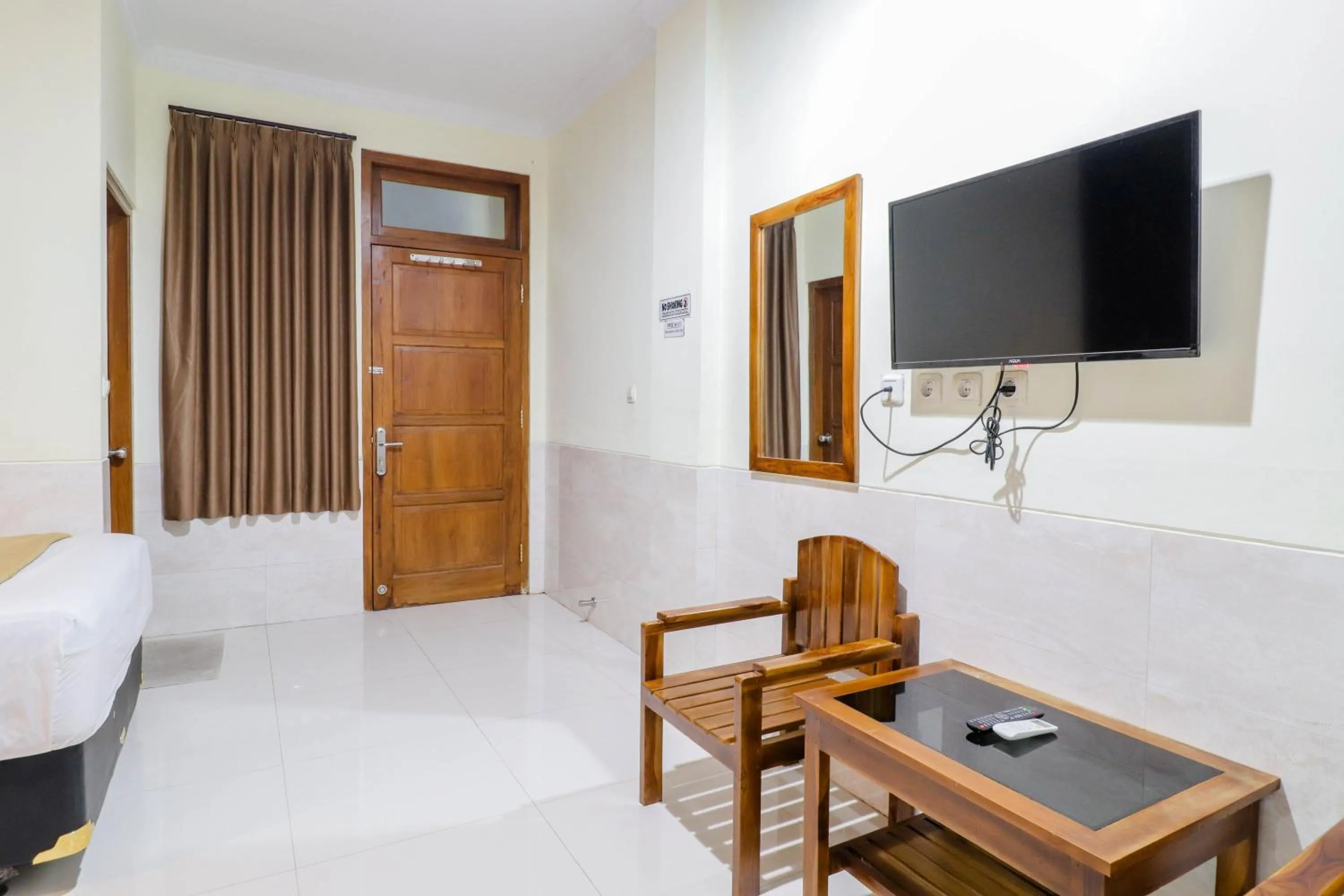 Bed in Hotel Safara Yogyakarta