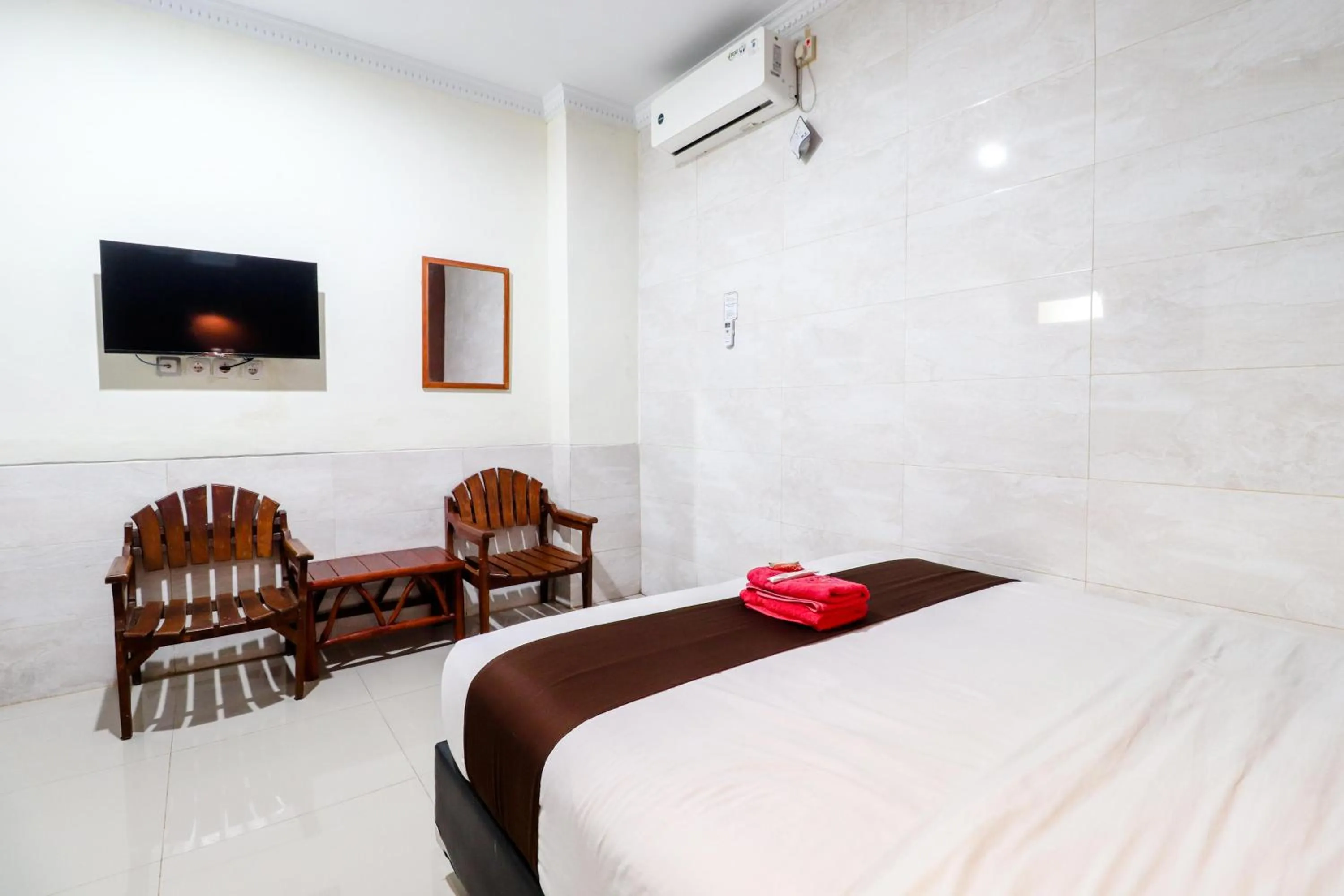 Bed in Hotel Safara Yogyakarta