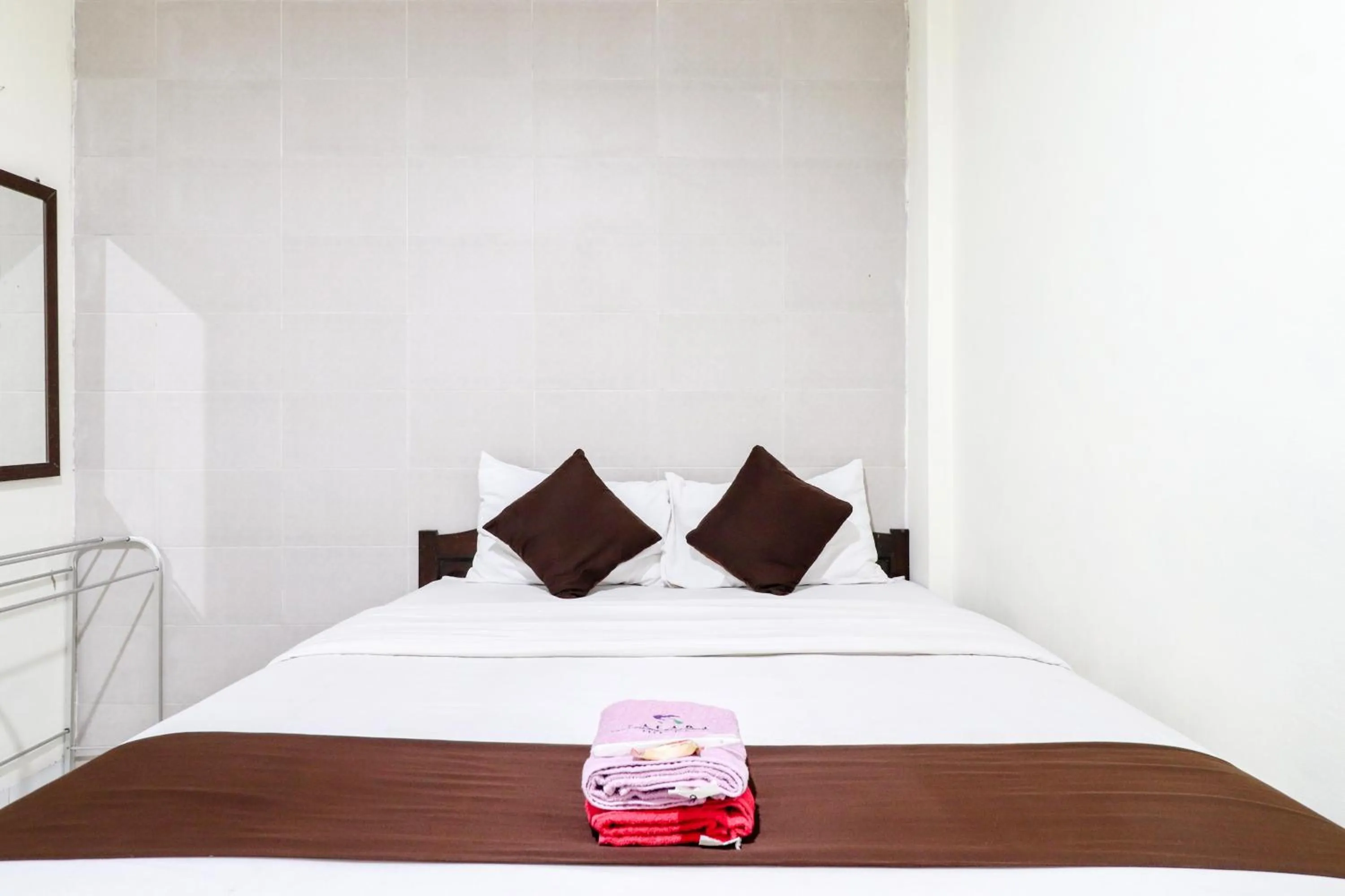 Bed in Hotel Safara Yogyakarta