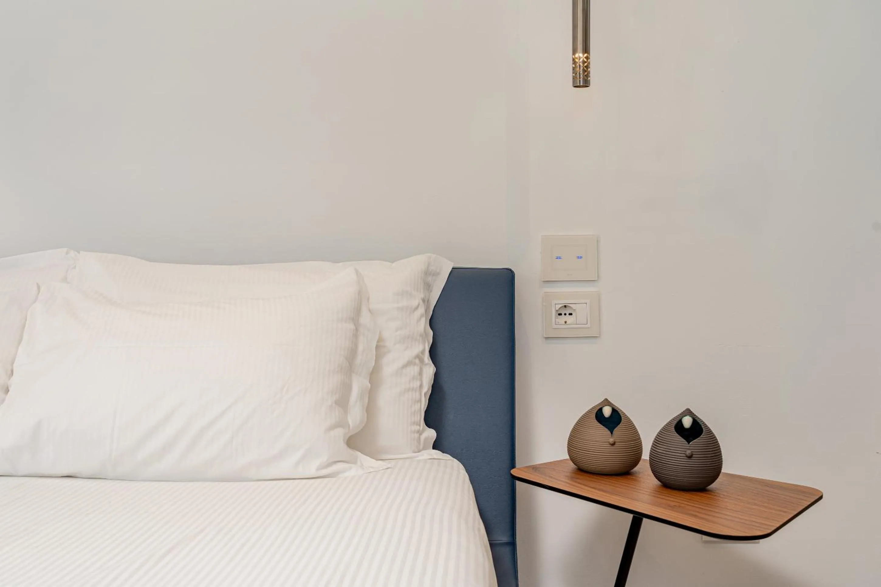 Bed in HOTIDAY Olbia Wallure