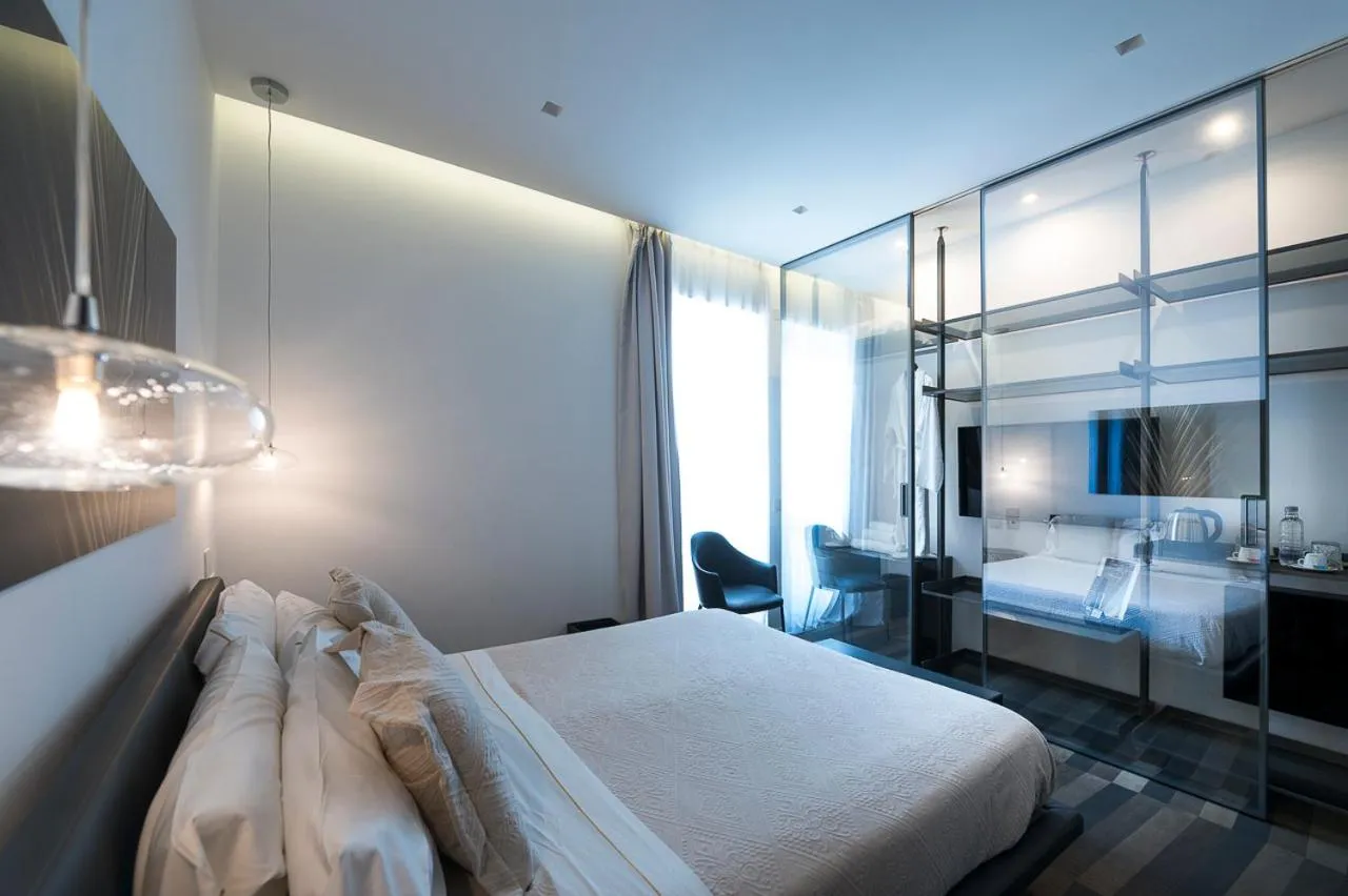 Photo of the whole room, Bed in HOTIDAY Olbia Wallure