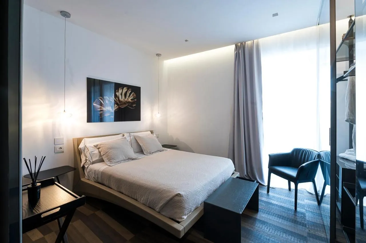 Photo of the whole room, Bed in HOTIDAY Olbia Wallure