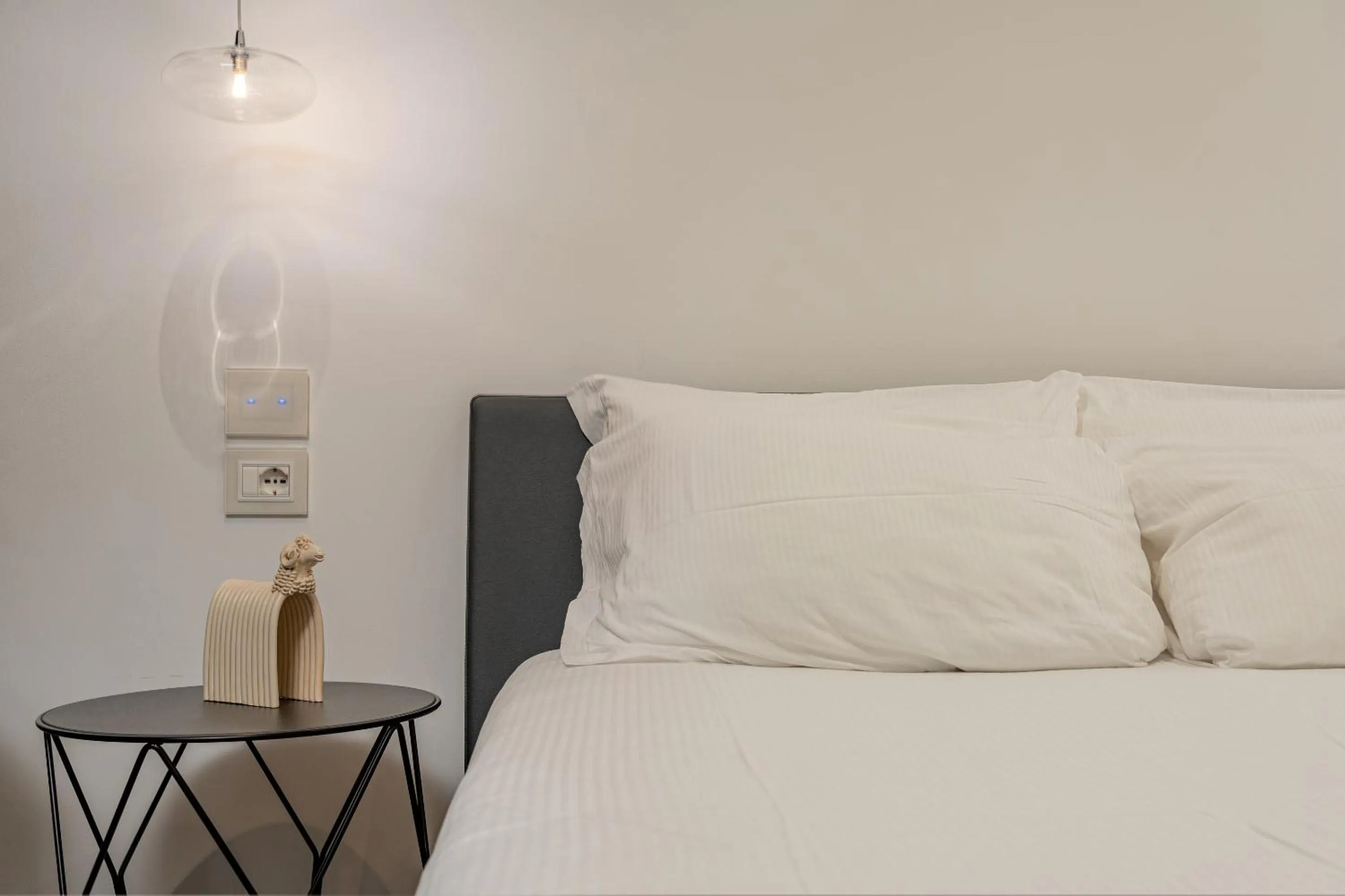 Bed in HOTIDAY Olbia Wallure