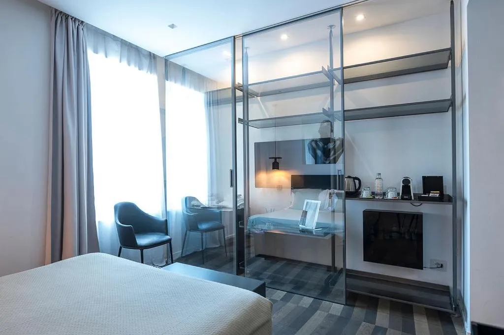 Photo of the whole room, Bed in HOTIDAY Olbia Wallure