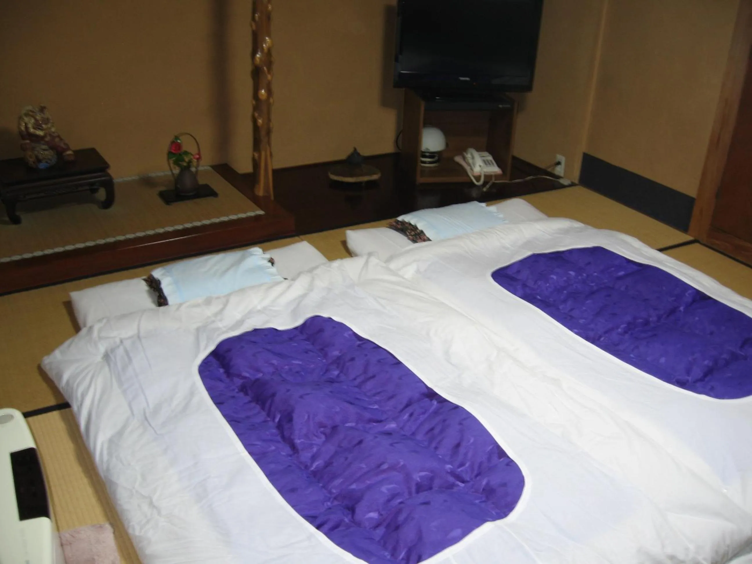 Bed in Maruka Ryokan